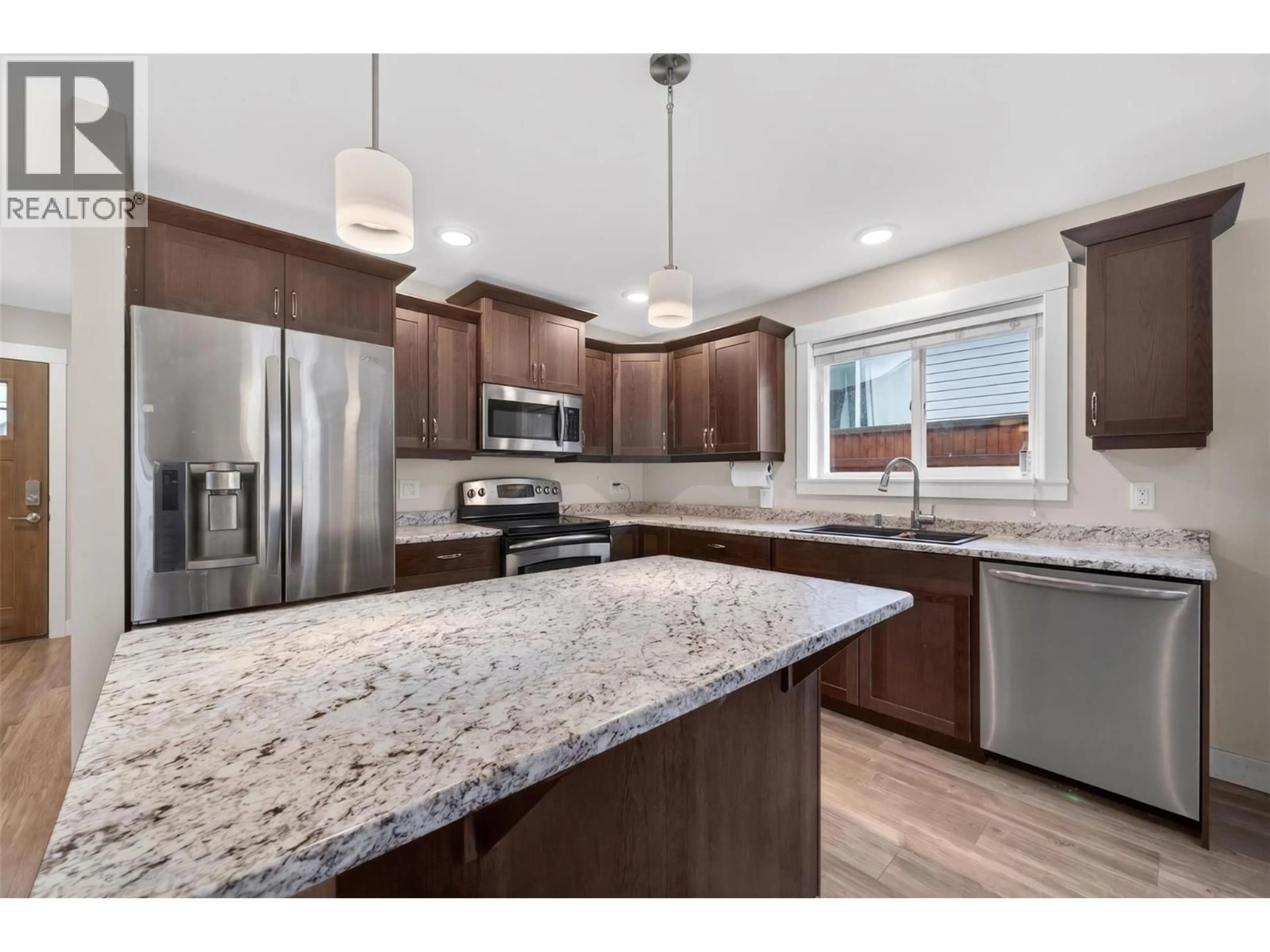 Open concept kitchen, unknown for 5480 CANOE BEACH DRIVE NORTHEAST, Salmon Arm British Columbia V1E2M5