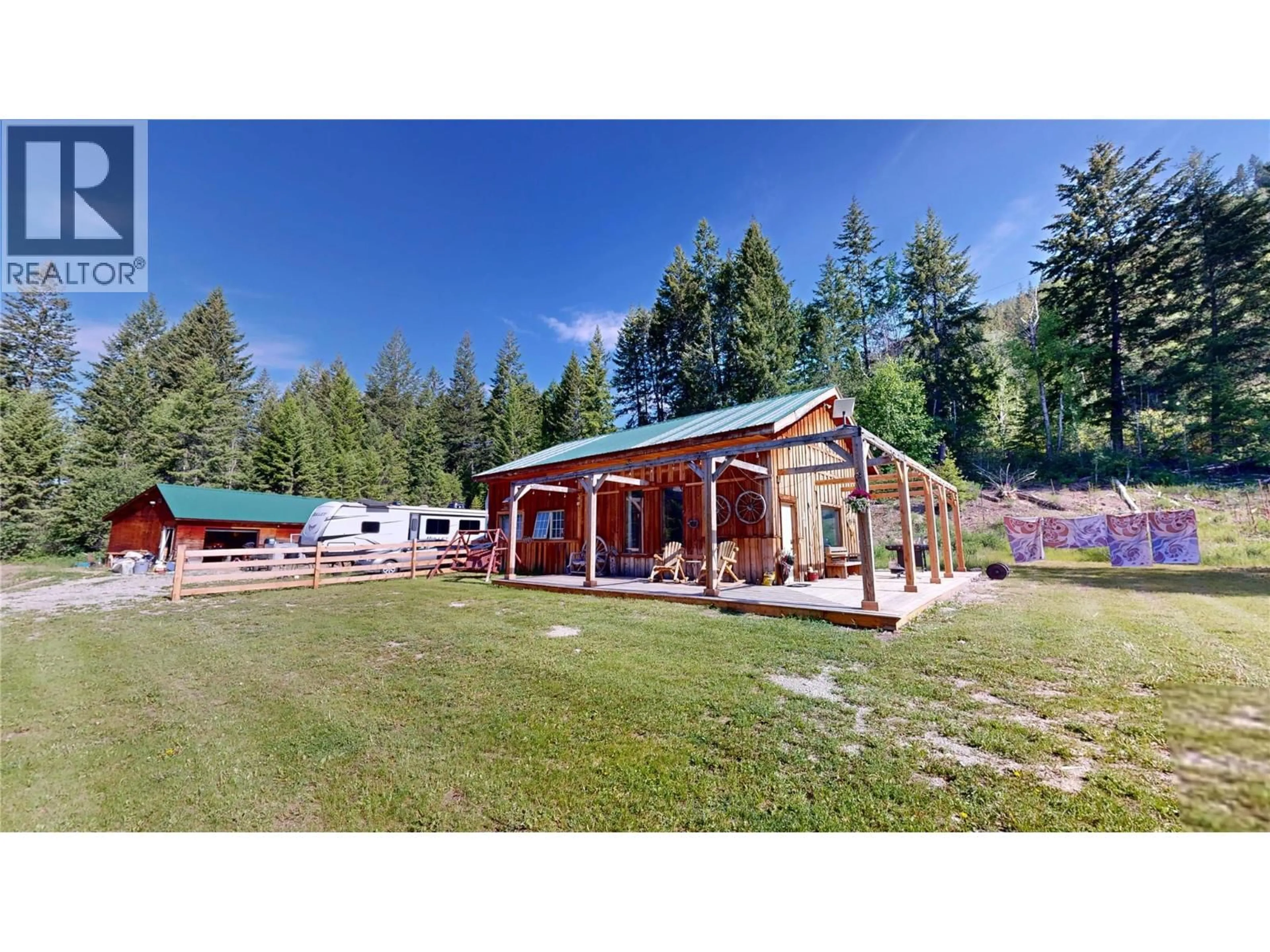 A pic from outside/outdoor area/front of a property/back of a property/a pic from drone, mountain view for 5055 95 HIGHWAY, Castledale British Columbia V0A1J0