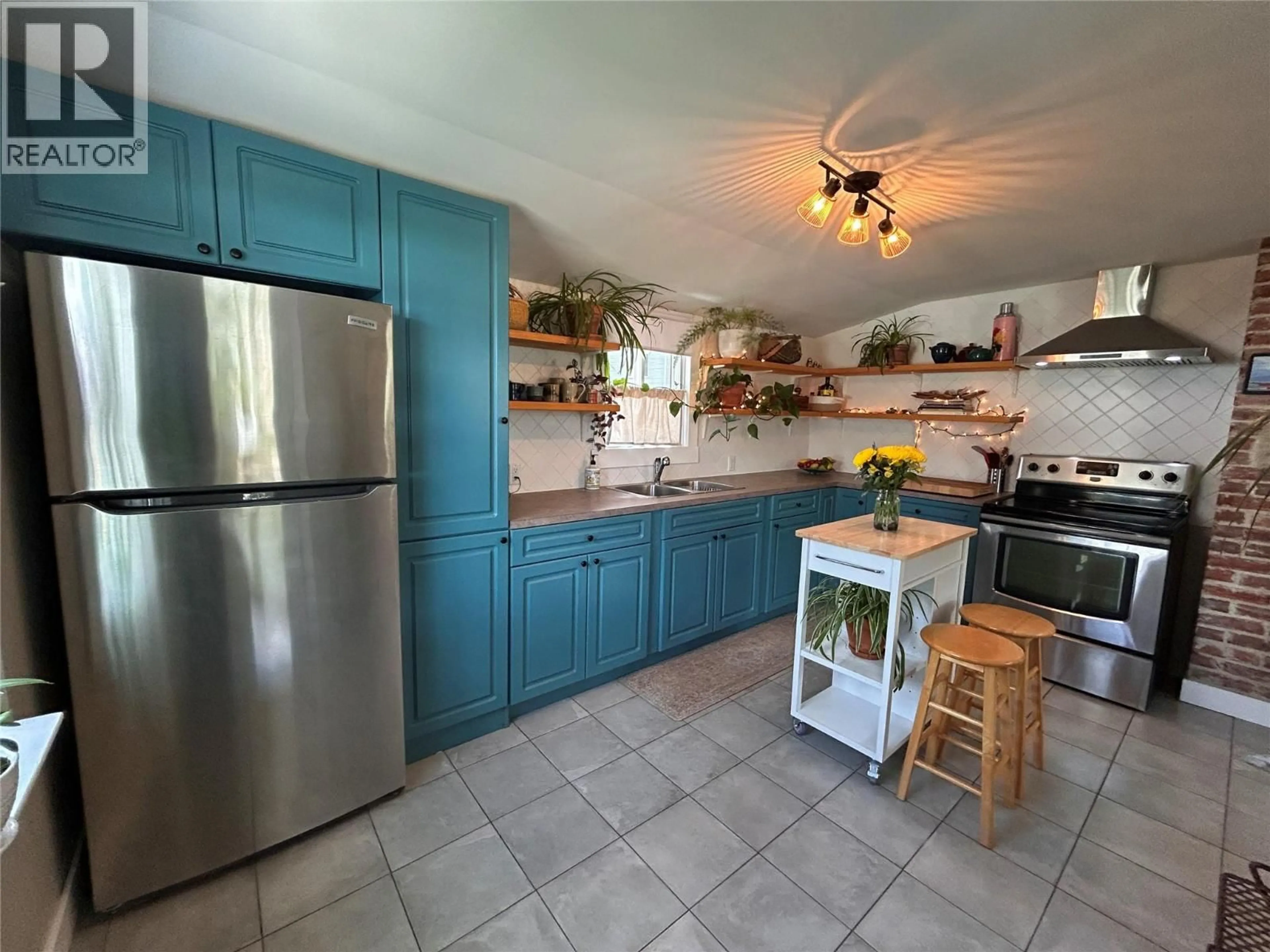 Open concept kitchen, ceramic/tile floor for 1350 MAIN STREET, Trail British Columbia V1R1Y1