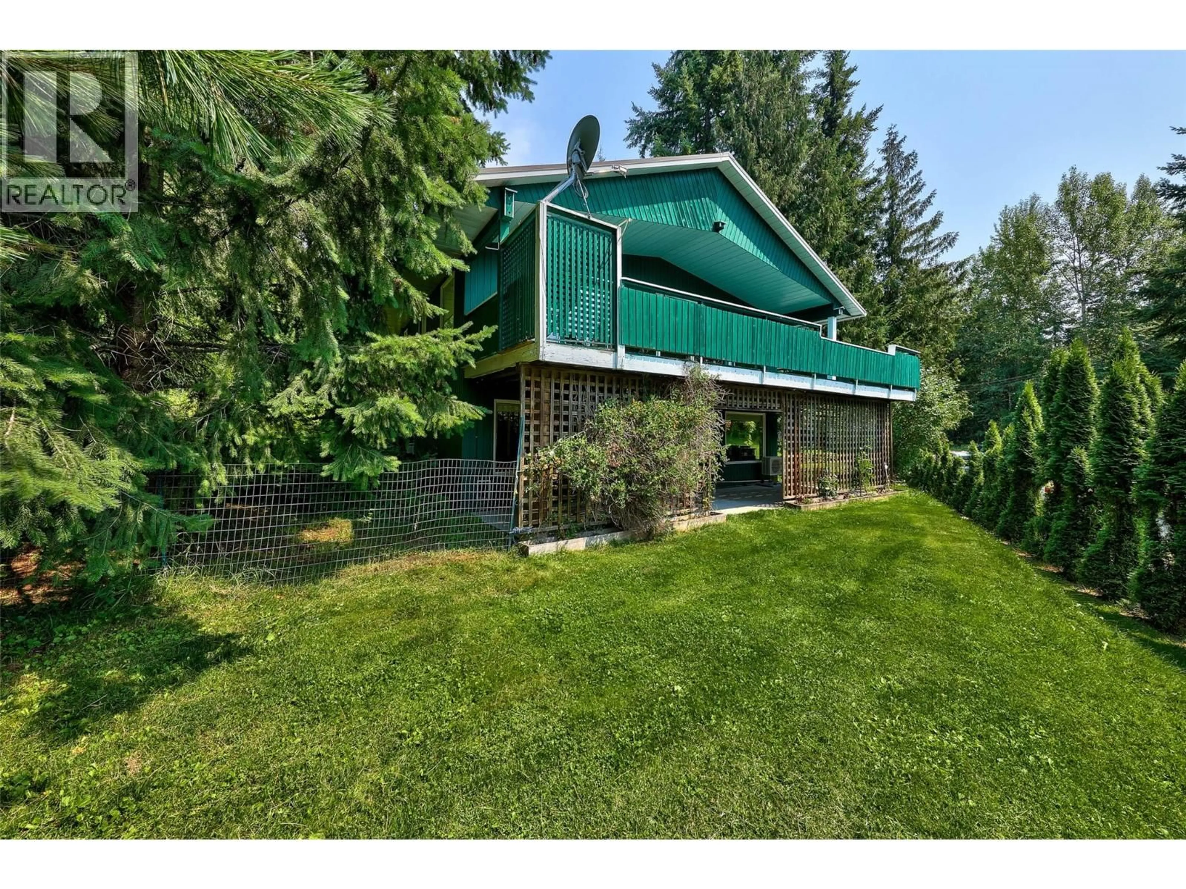A pic from outside/outdoor area/front of a property/back of a property/a pic from drone, unknown for 7280 BIRCH CLOSE, Anglemont British Columbia V0E1M8