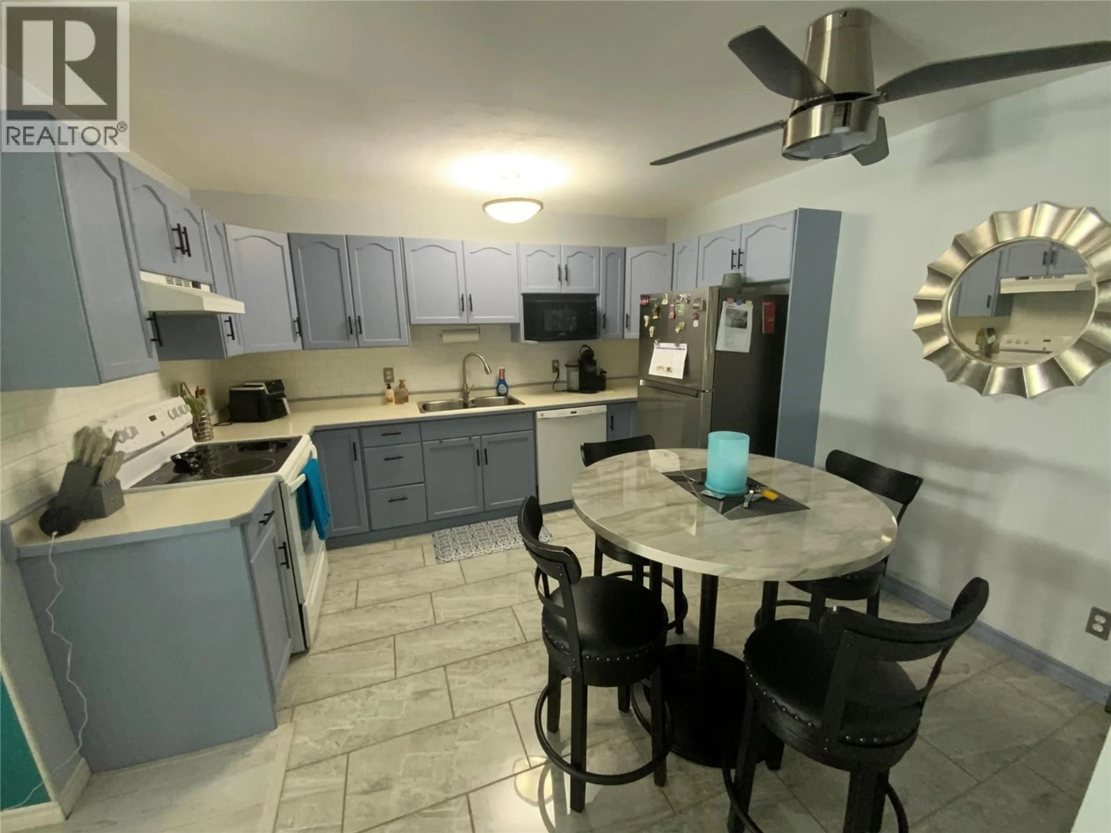Open concept kitchen, ceramic/tile floor for 204 - 865 MAIN STREET, Penticton British Columbia V2A5E3