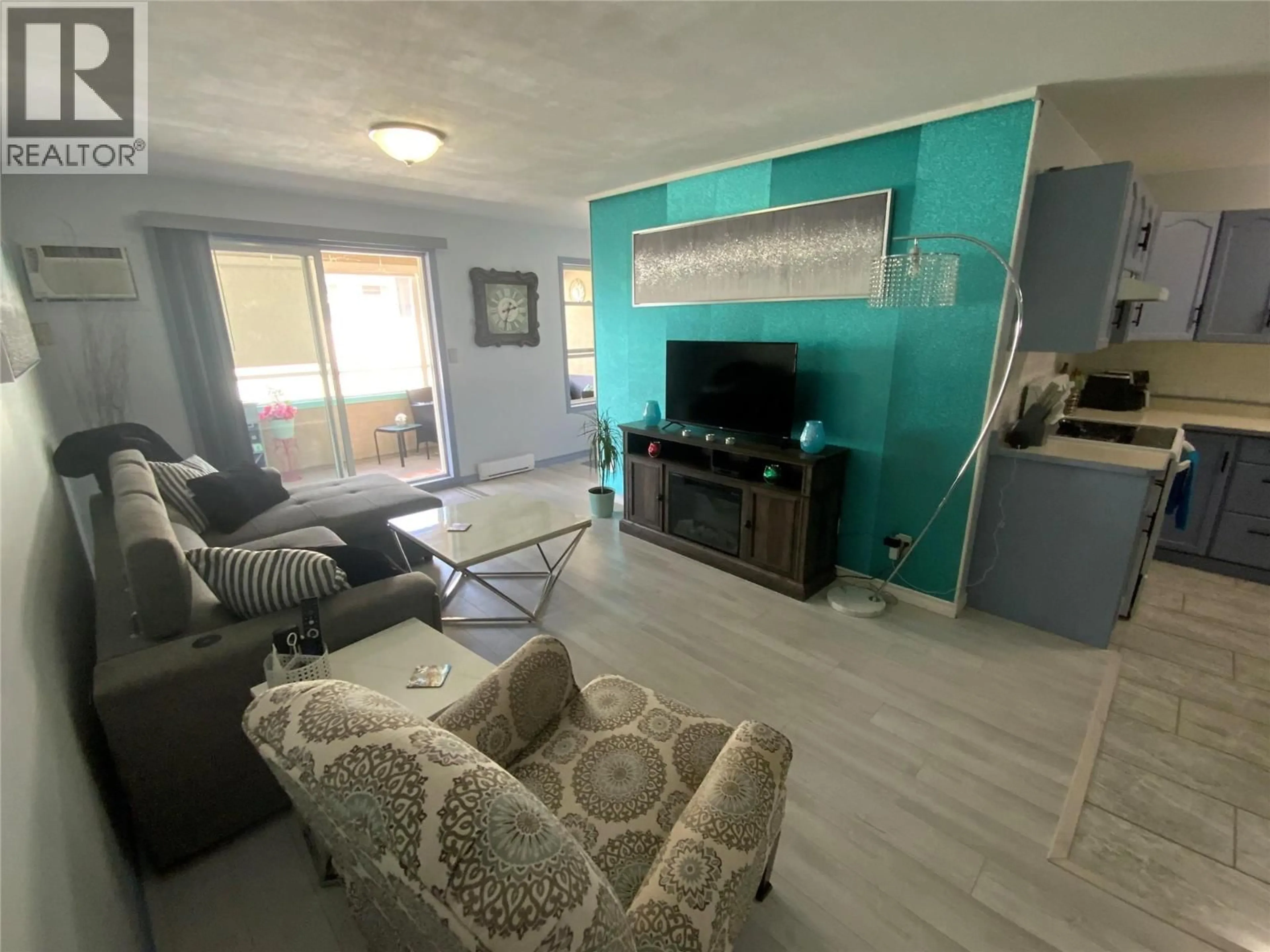 Living room with furniture, unknown for 204 - 865 MAIN STREET, Penticton British Columbia V2A5E3