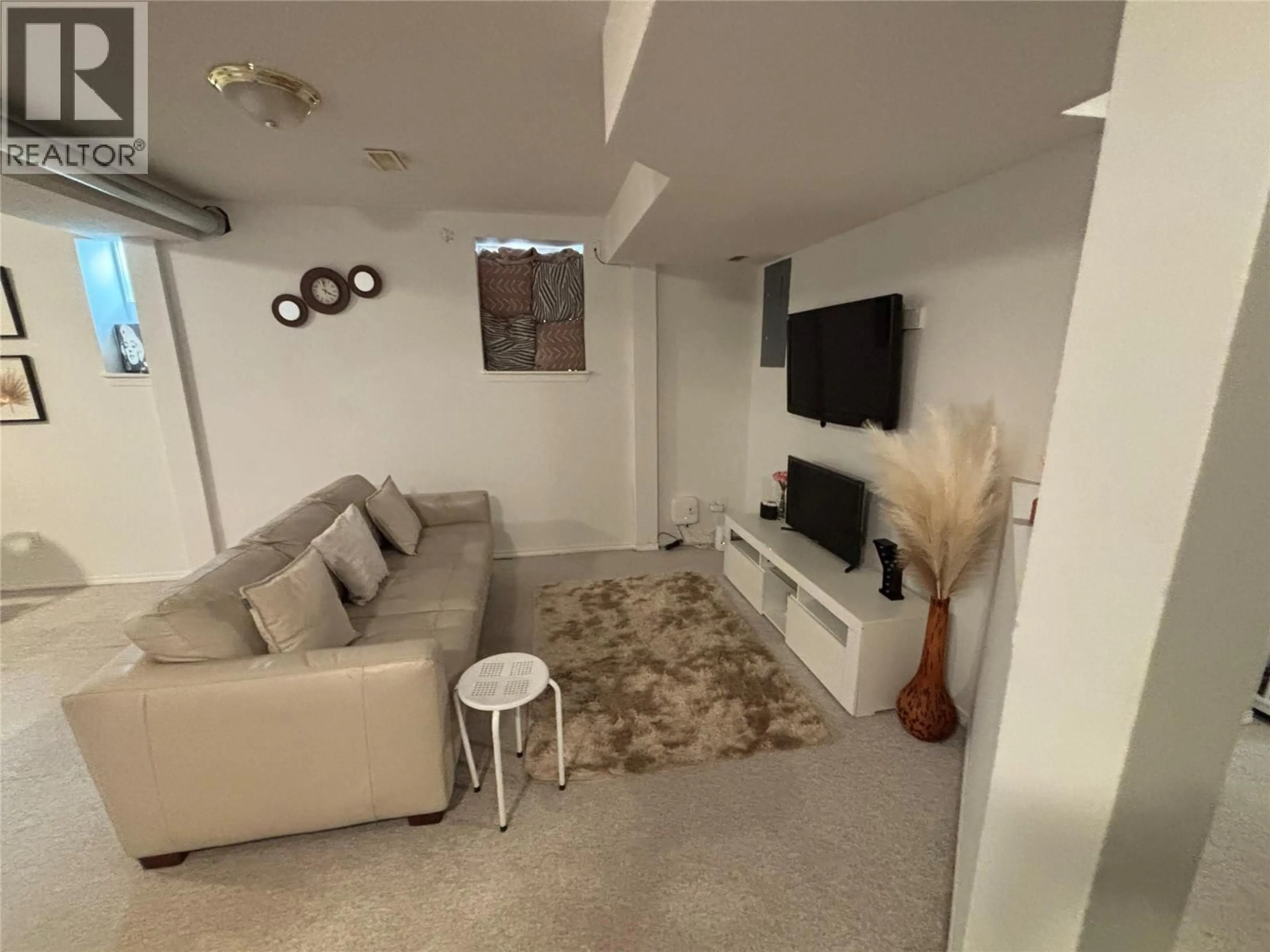 Living room with furniture, unknown for 741 DUNROBIN DRIVE, Kamloops British Columbia V1S1V9