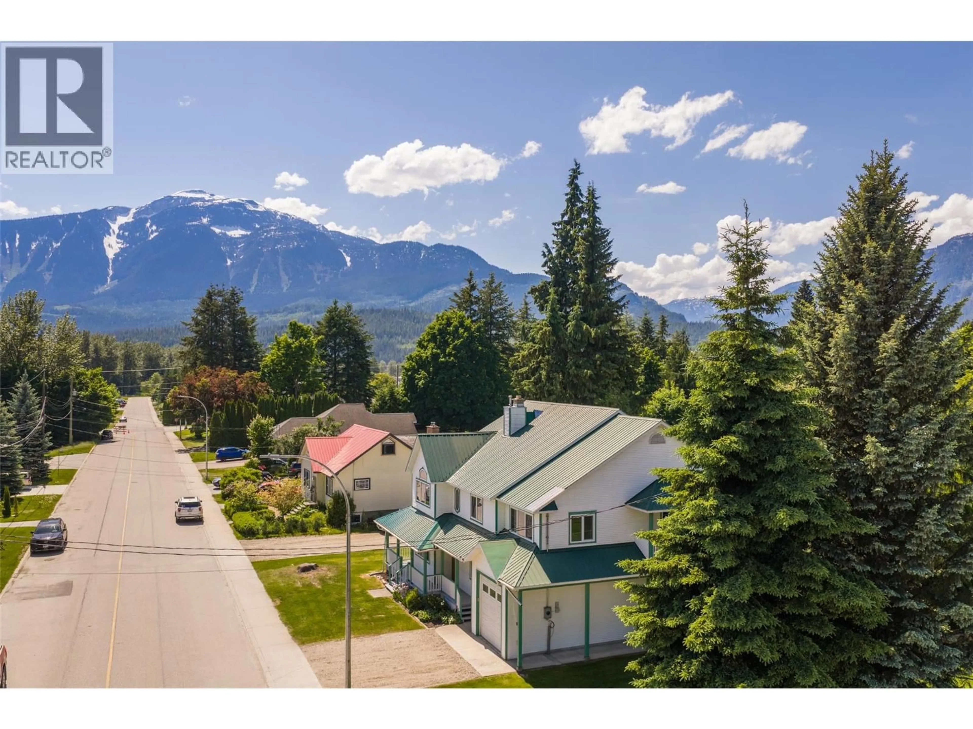 A pic from outside/outdoor area/front of a property/back of a property/a pic from drone, mountain view for 701 EDWARD STREET, Revelstoke British Columbia V0E2S1