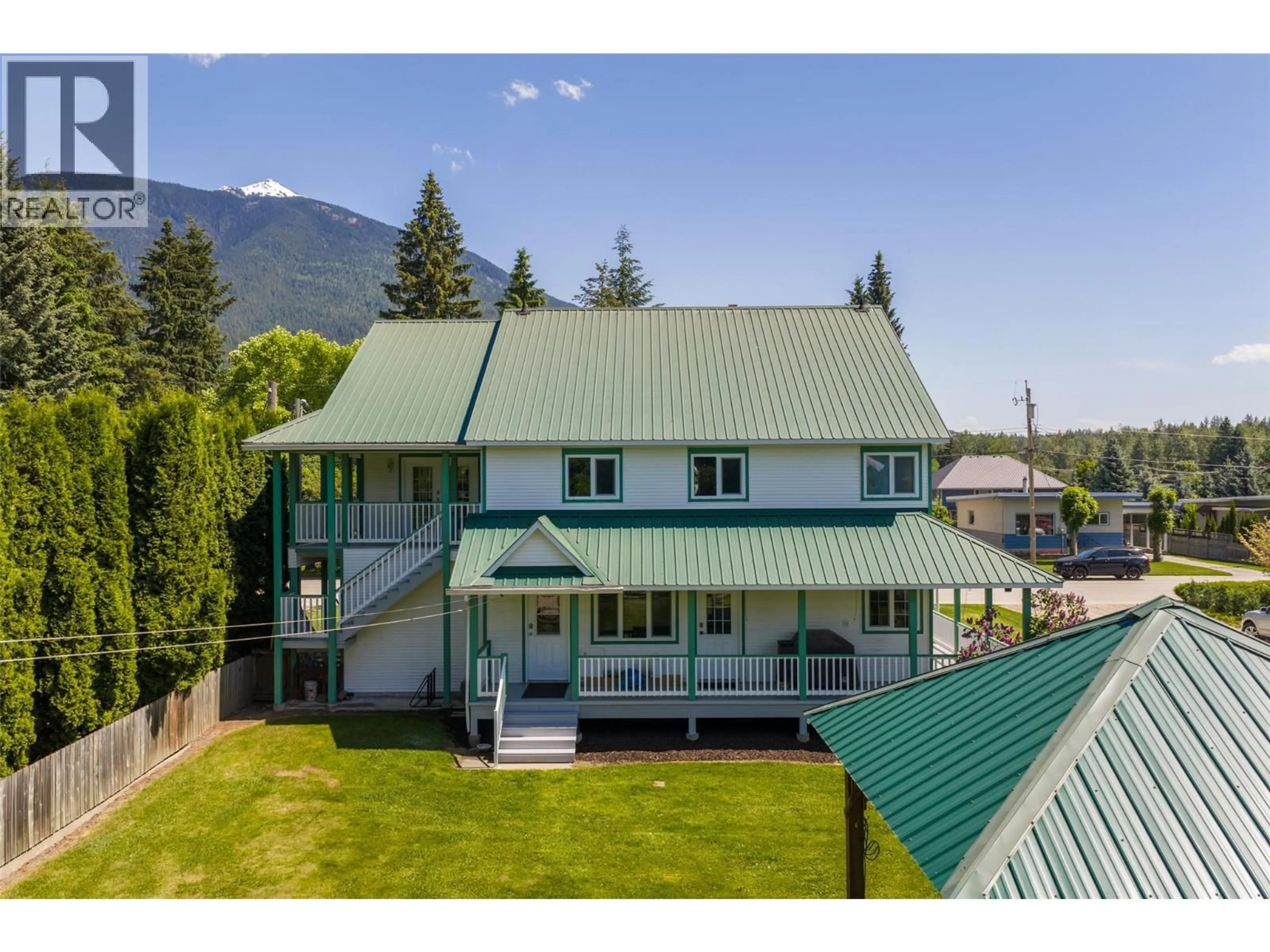 A pic from outside/outdoor area/front of a property/back of a property/a pic from drone, mountain view for 701 EDWARD STREET, Revelstoke British Columbia V0E2S1