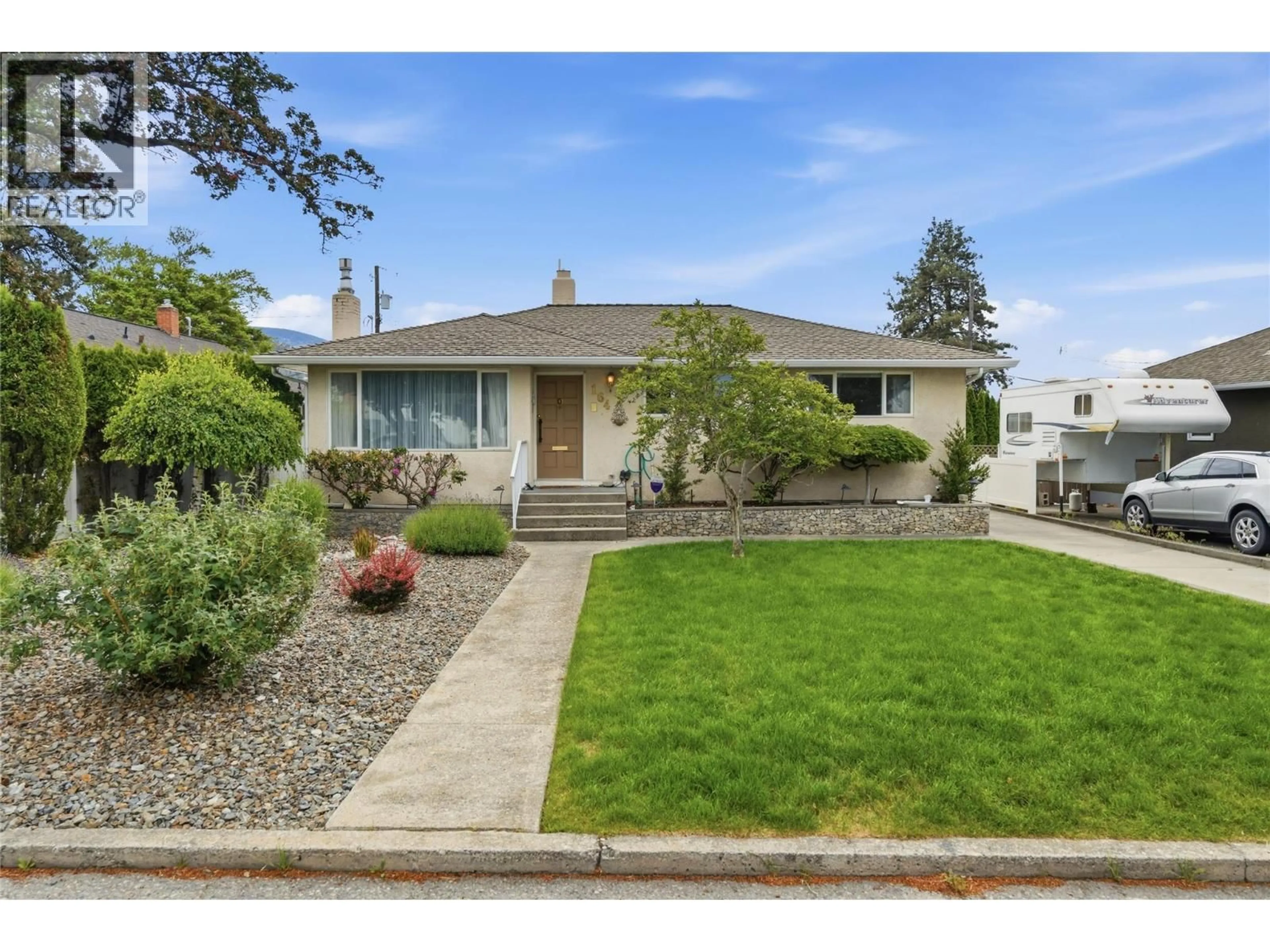 Home with vinyl exterior material, street for 164 MANOR PARK AVENUE, Penticton British Columbia V2A2R2