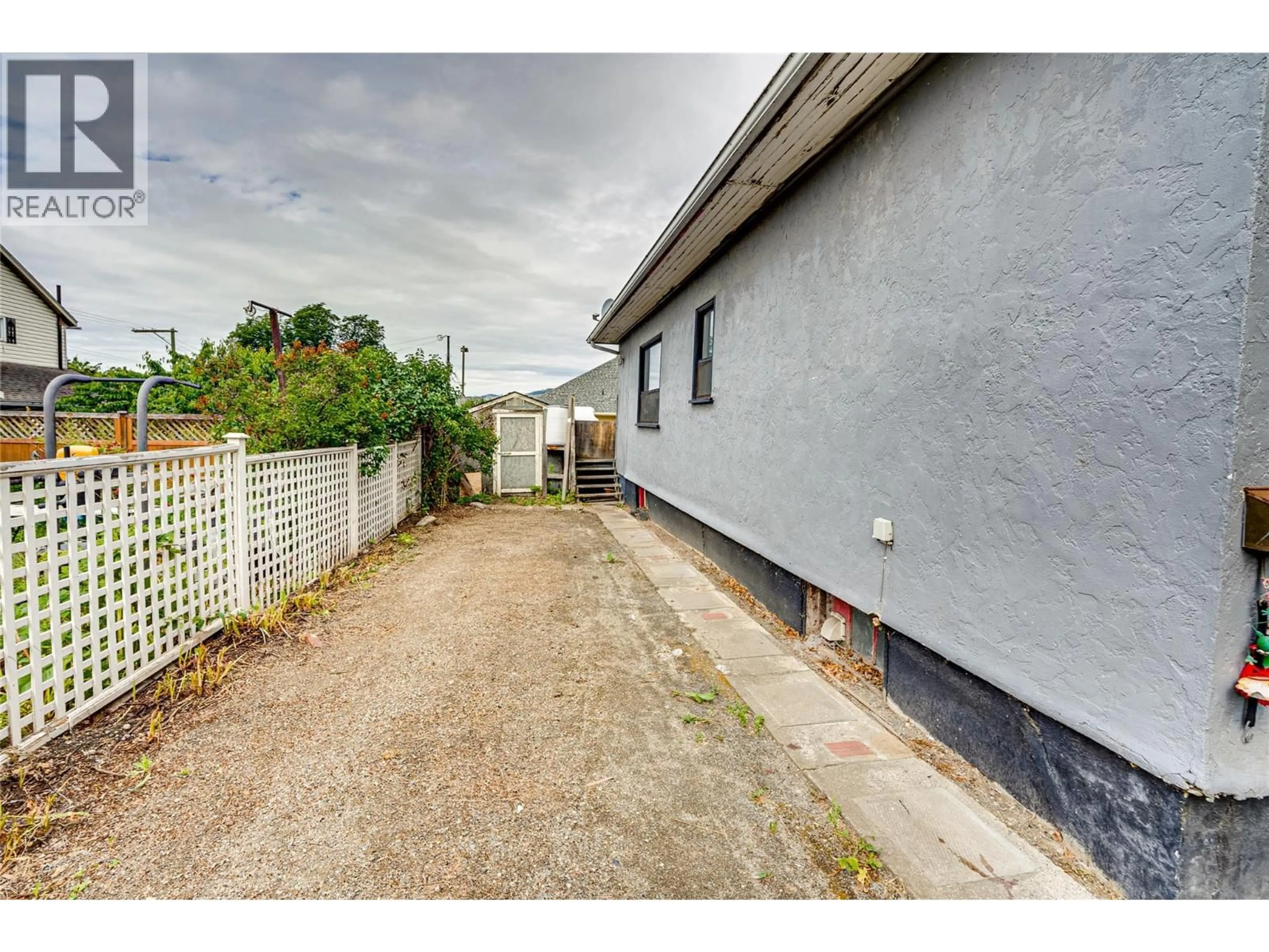 A pic from outside/outdoor area/front of a property/back of a property/a pic from drone, street for 3202 26 STREET, Vernon British Columbia V1T4V3