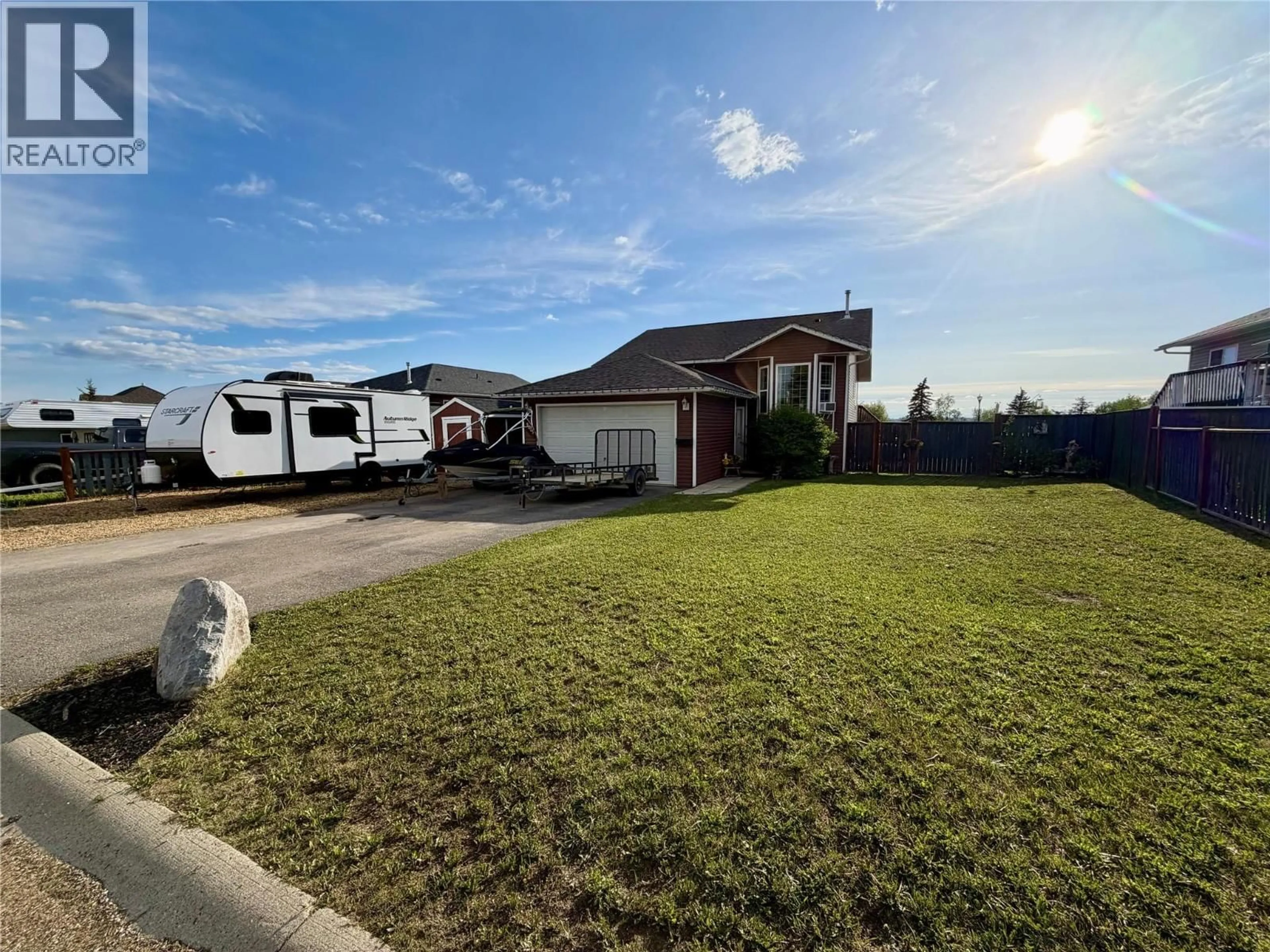 A pic from outside/outdoor area/front of a property/back of a property/a pic from drone, street for 9005 19 STREET, Dawson Creek British Columbia V1G4E3