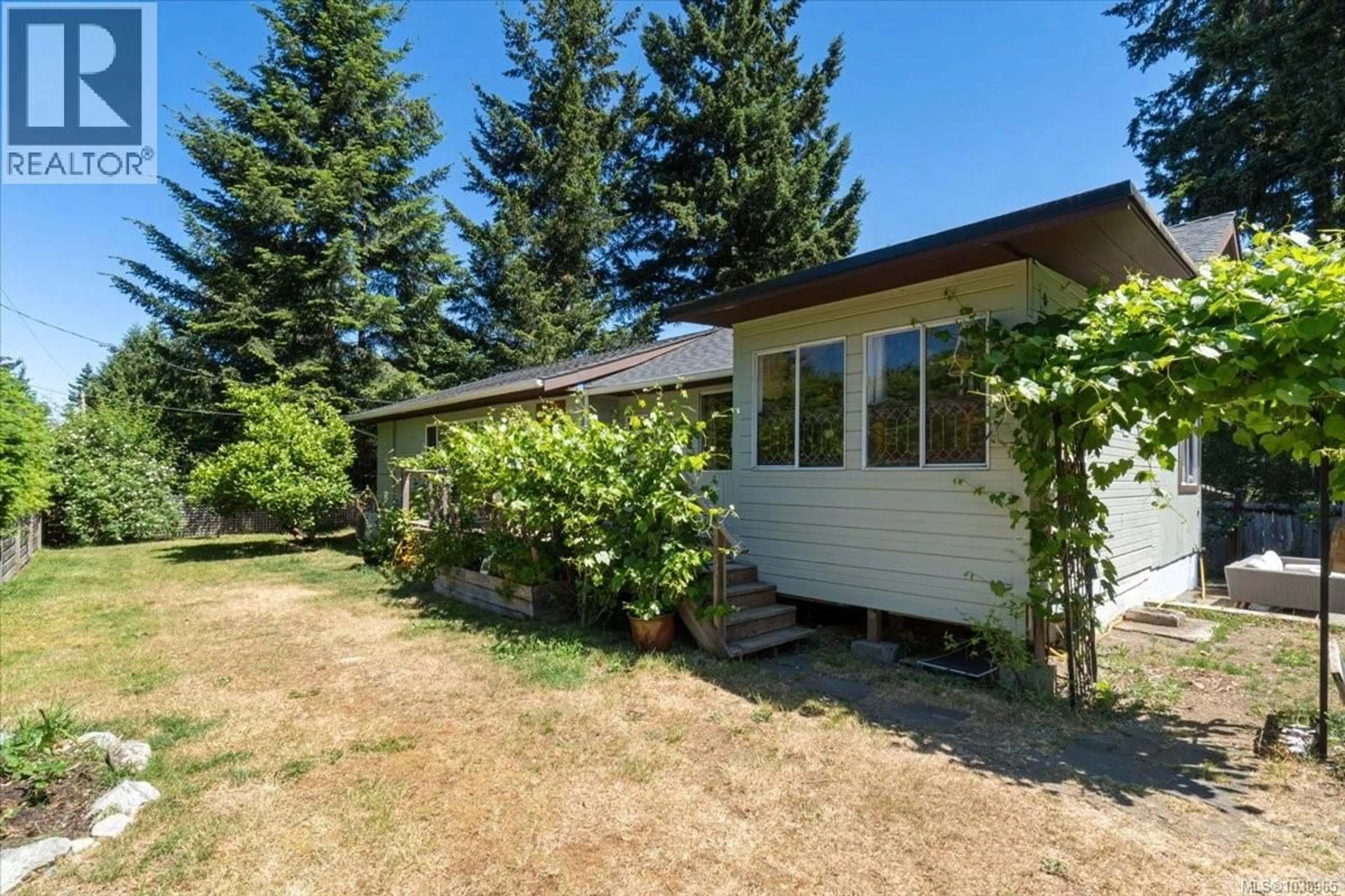 A pic from outside/outdoor area/front of a property/back of a property/a pic from drone, unknown for 980 POPLAR WAY, Whiskey Creek British Columbia V9K1X9