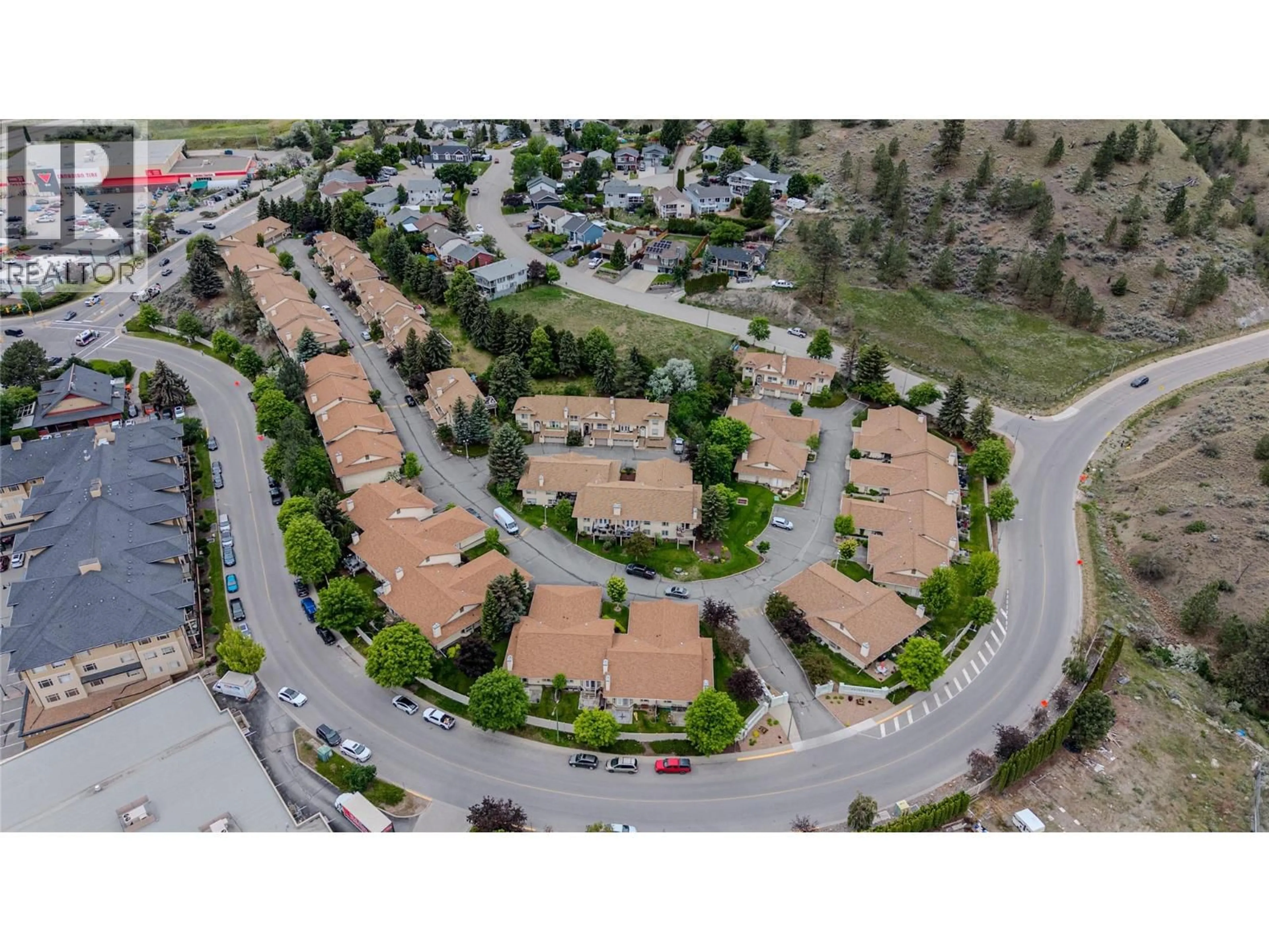 A pic from outside/outdoor area/front of a property/back of a property/a pic from drone, street for 51 - 1750 PACIFIC WAY, Kamloops British Columbia V2E2K8