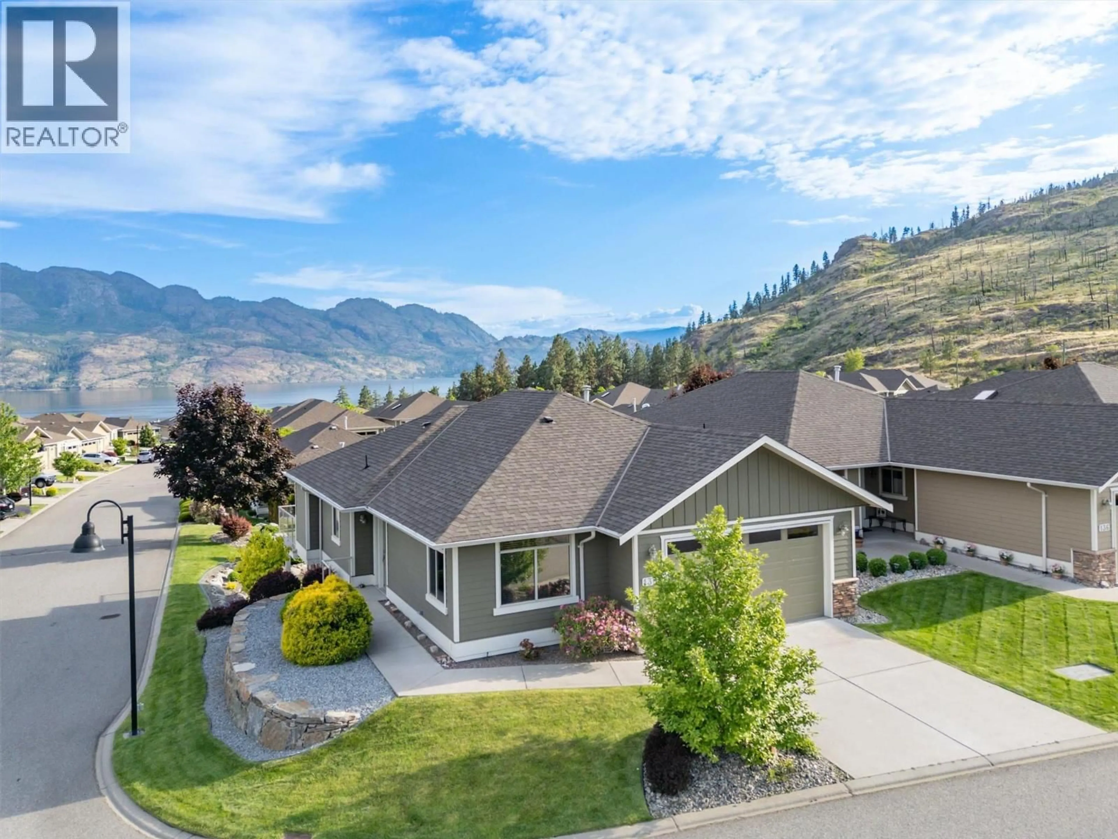 A pic from outside/outdoor area/front of a property/back of a property/a pic from drone, mountain view for 135 - 4035 GELLATLY ROAD SOUTH, West Kelowna British Columbia V4T1R7