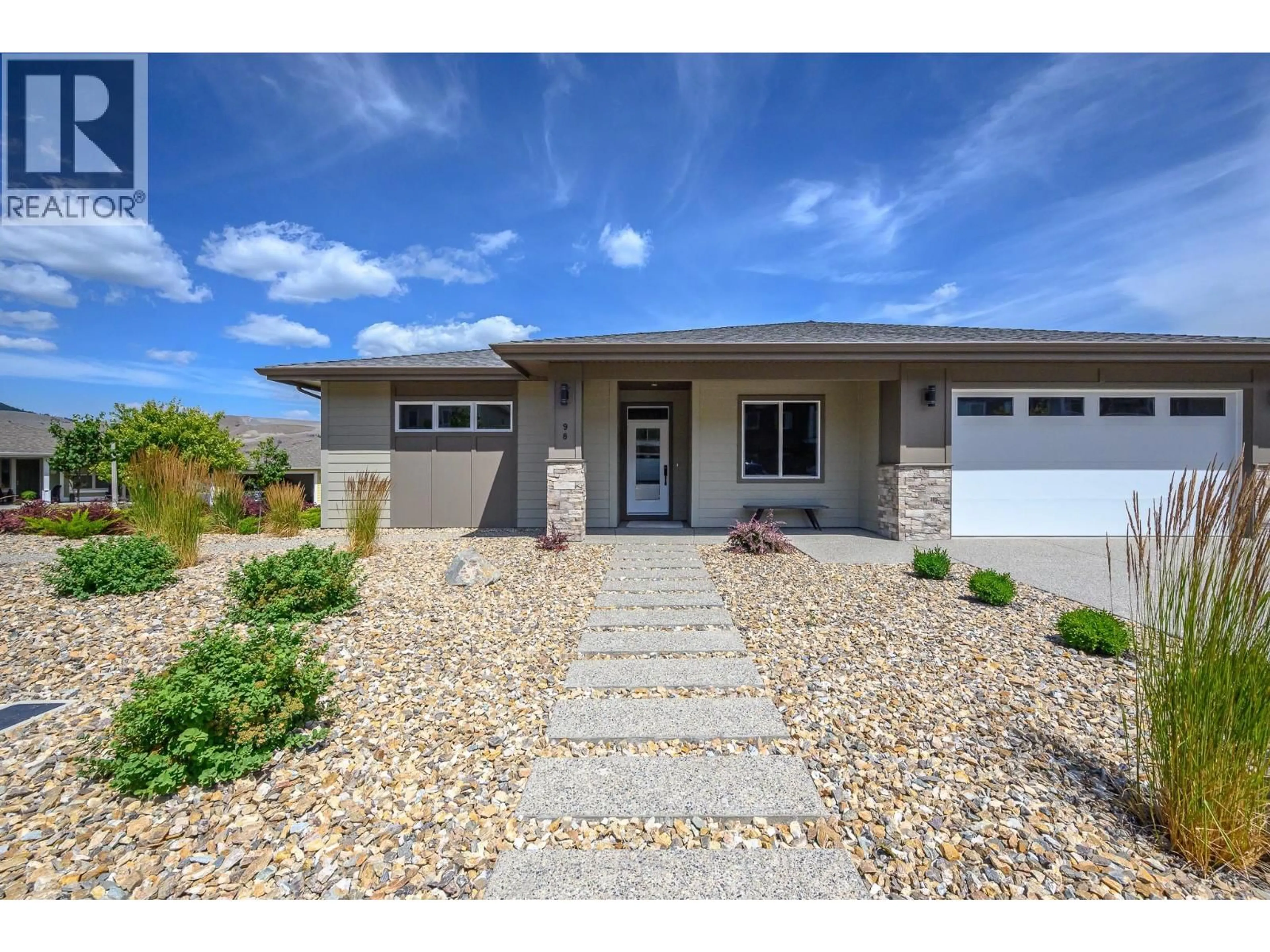 Home with vinyl exterior material, street for 98 - 7760 OKANAGAN LANDING ROAD, Okanagan Landing British Columbia V1H1Z4