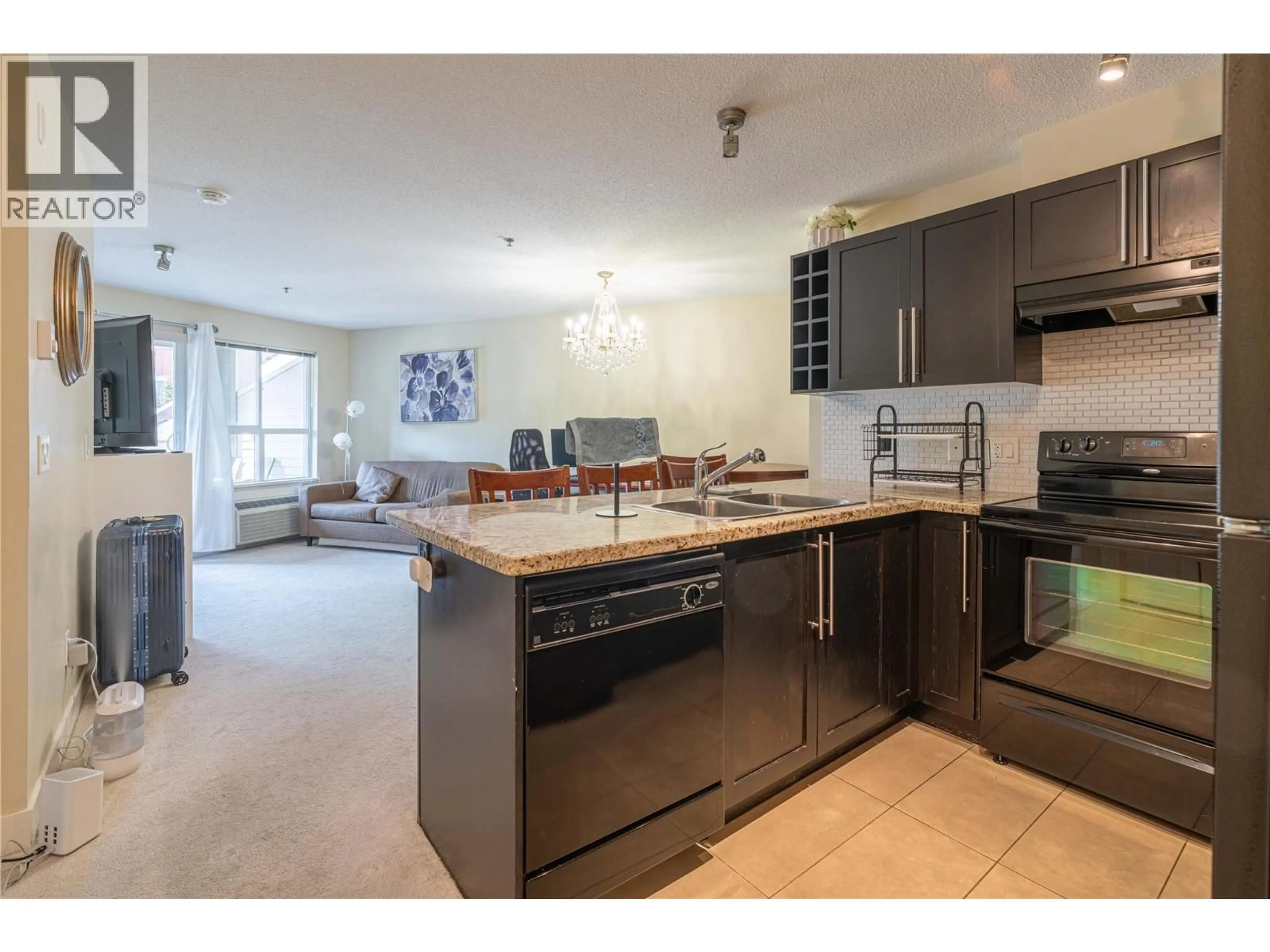 Open concept kitchen, unknown for 218 - 1089 SUNSET DRIVE, Kelowna British Columbia V1Y9Z3