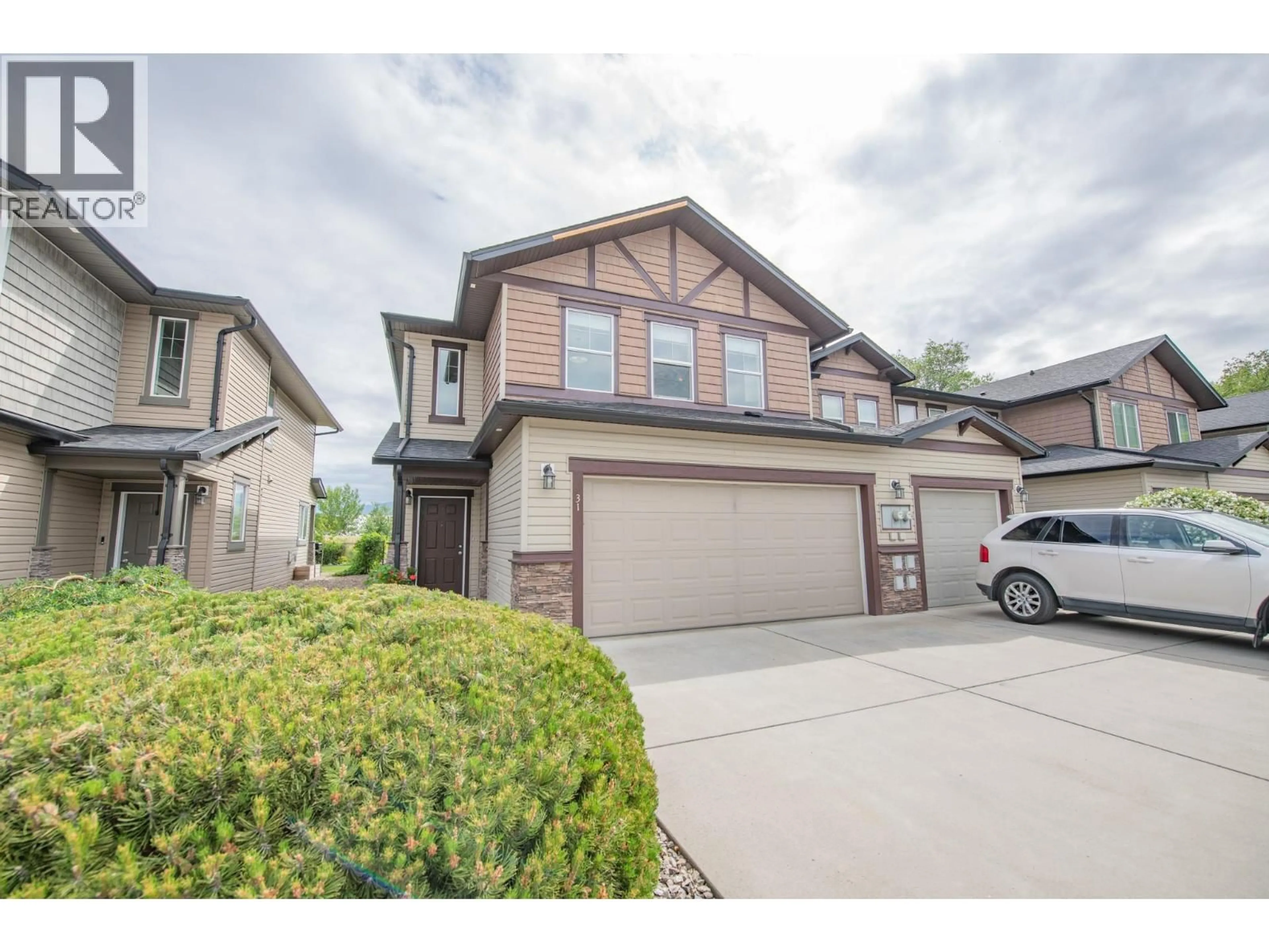 A pic from outside/outdoor area/front of a property/back of a property/a pic from drone, street for 31 - 6900 MARSHALL ROAD, Vernon British Columbia V1H2J8