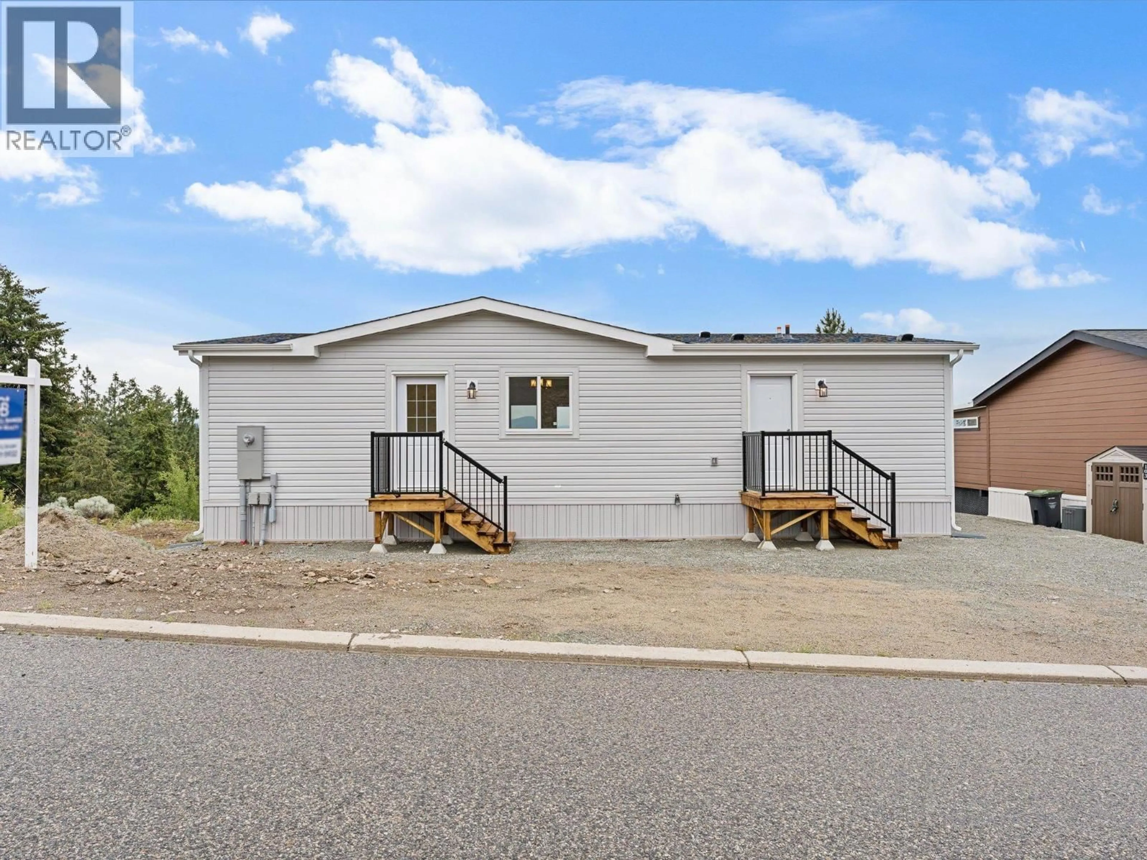 Home with vinyl exterior material, street for 102 - 1750 LENZ ROAD, West Kelowna British Columbia V1Z3N1