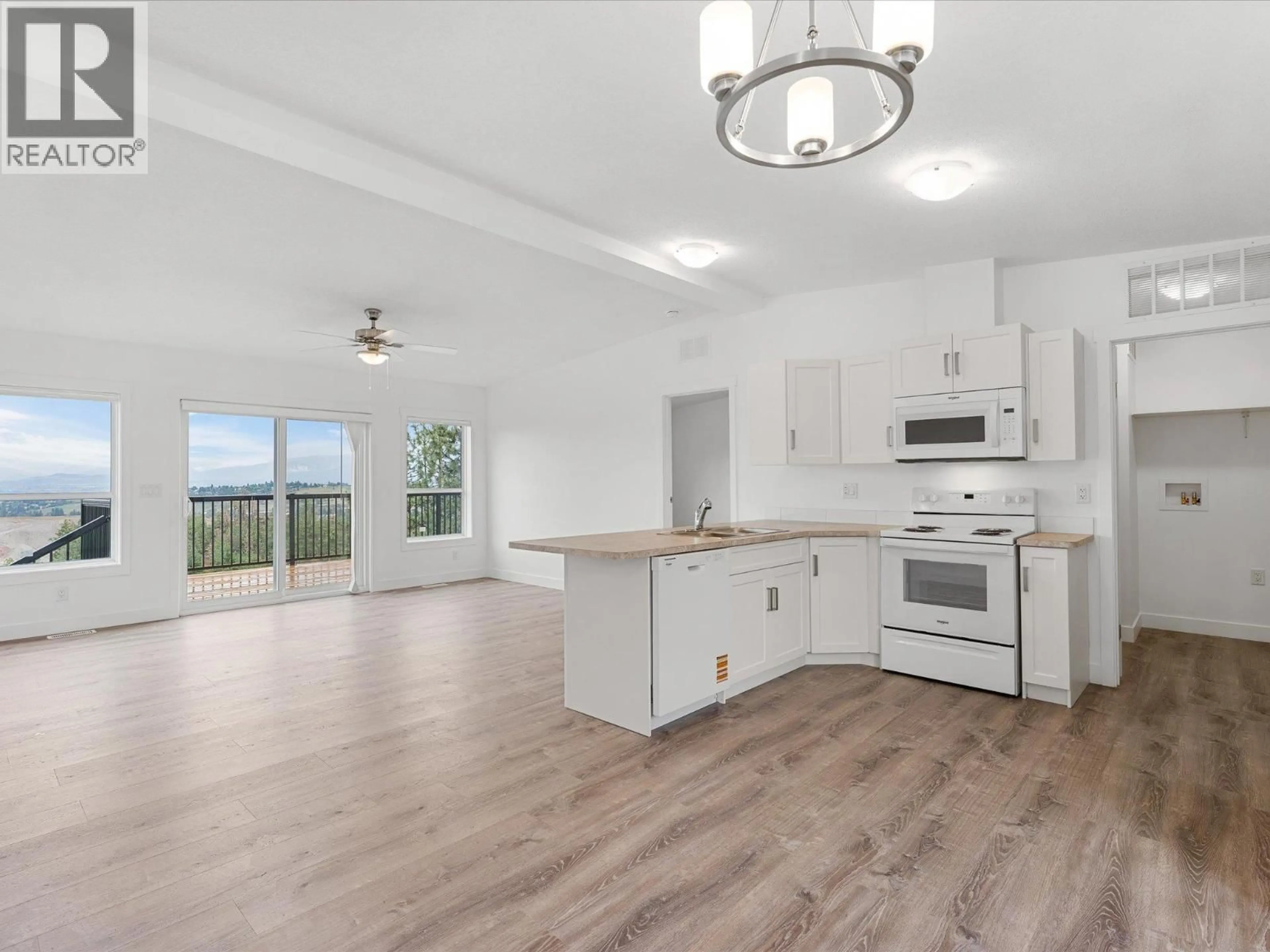 Open concept kitchen, unknown for 102 - 1750 LENZ ROAD, West Kelowna British Columbia V1Z3N1