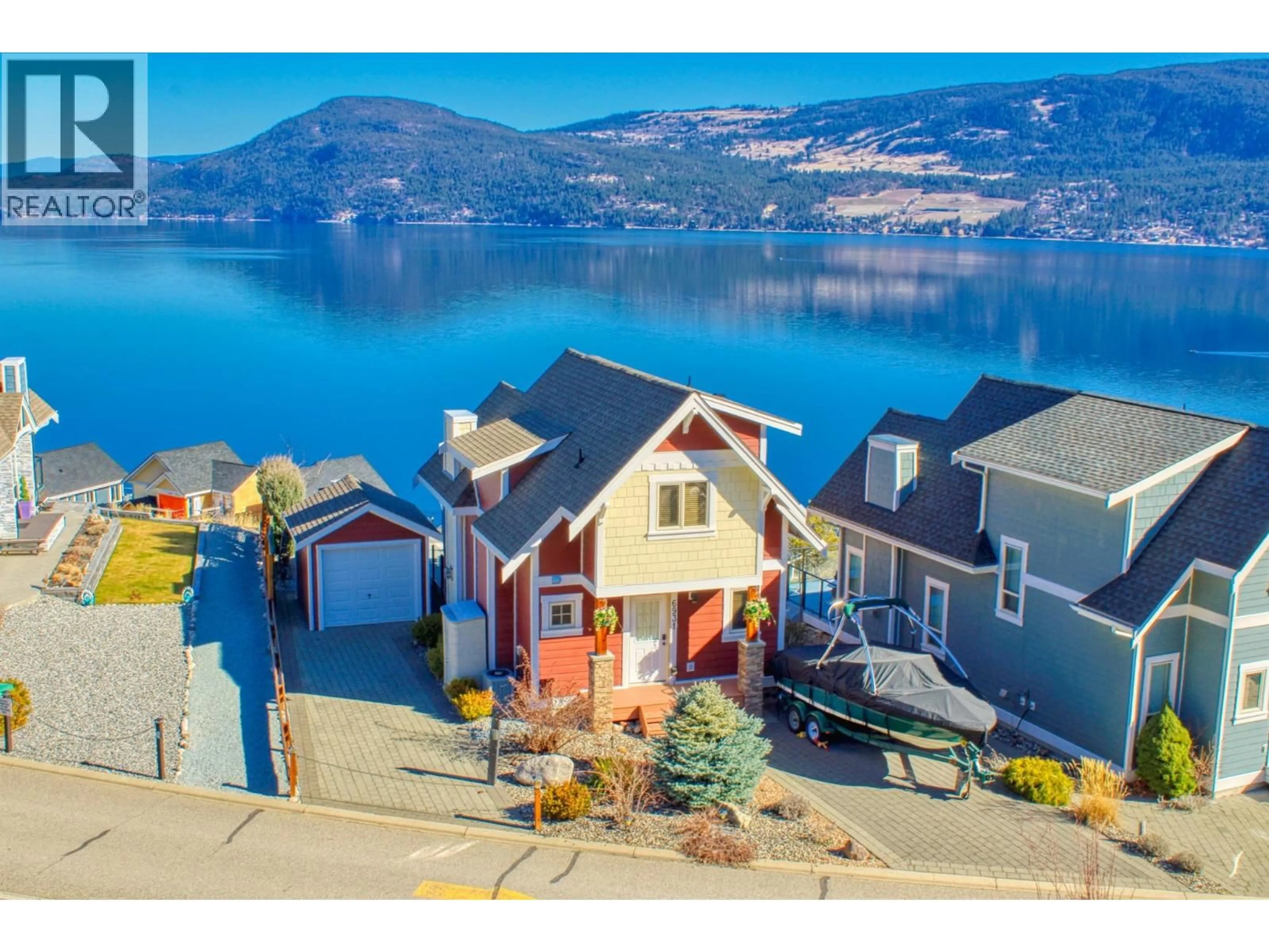 A pic from outside/outdoor area/front of a property/back of a property/a pic from drone, water/lake/river/ocean view for 62 - 6931 BARCELONA DRIVE, Kelowna British Columbia V1Z3R8