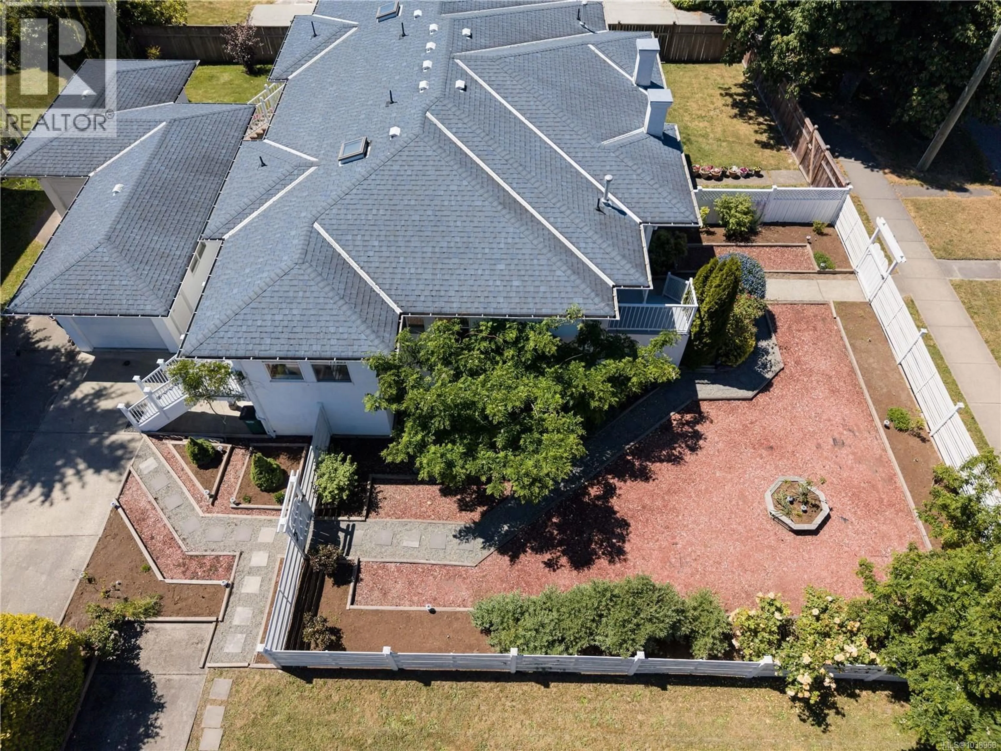 A pic from outside/outdoor area/front of a property/back of a property/a pic from drone, street for 1843 FELTHAM ROAD, Saanich British Columbia V8N2A4