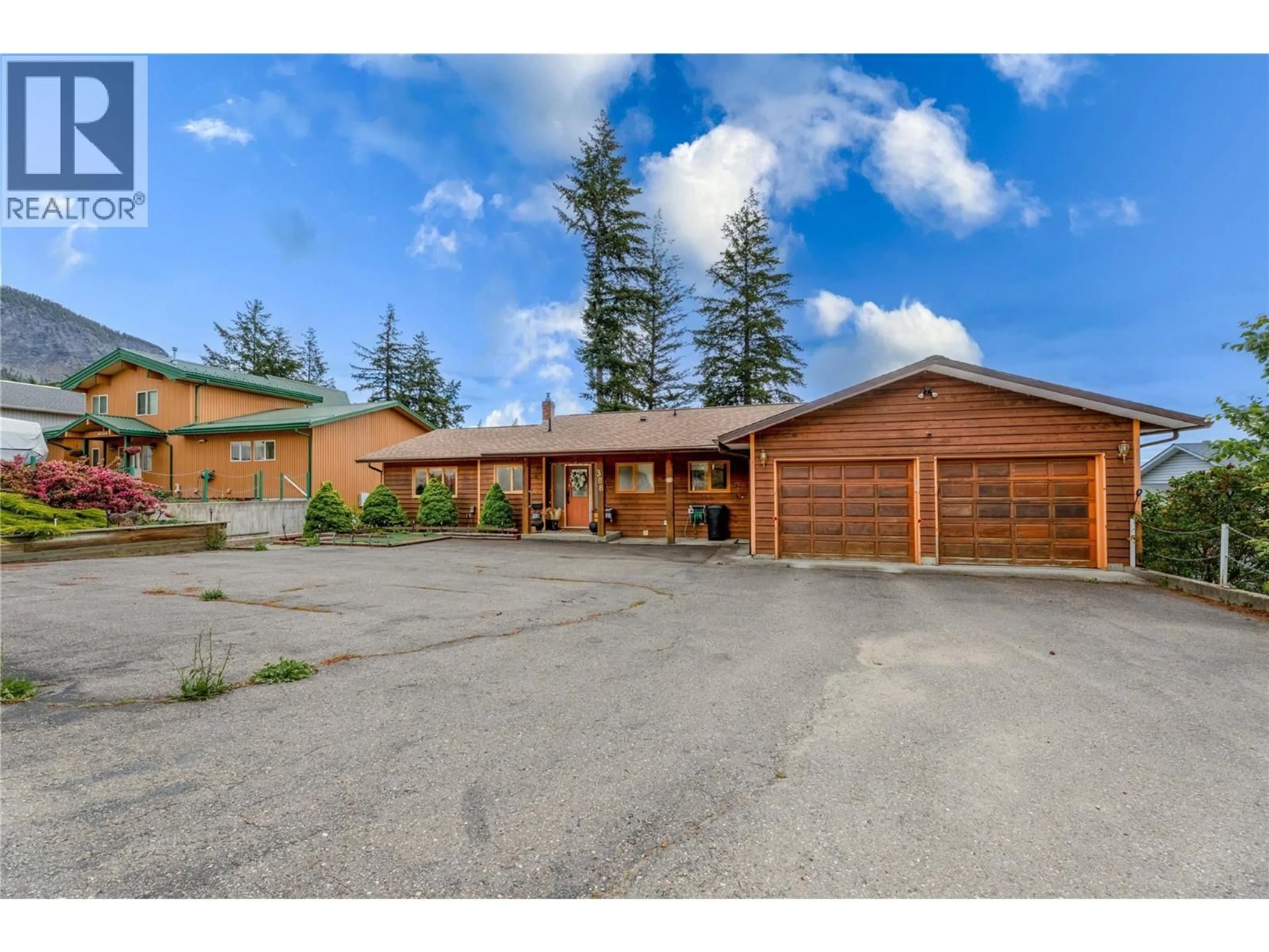 A pic from outside/outdoor area/front of a property/back of a property/a pic from drone, street for 388 SUMAC ROAD, Tappen British Columbia V0E2X1