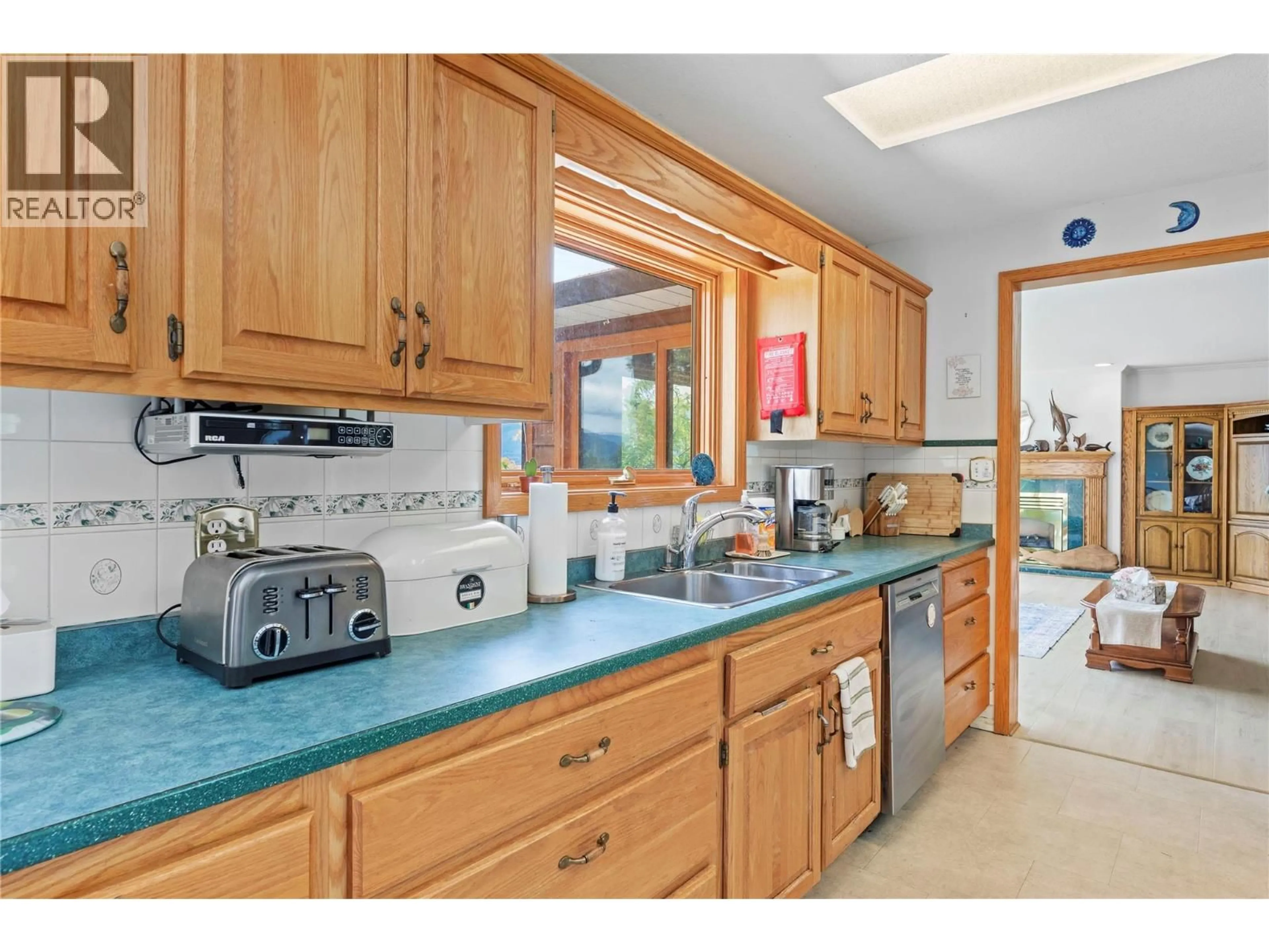 Standard kitchen, ceramic/tile floor for 388 SUMAC ROAD, Tappen British Columbia V0E2X1