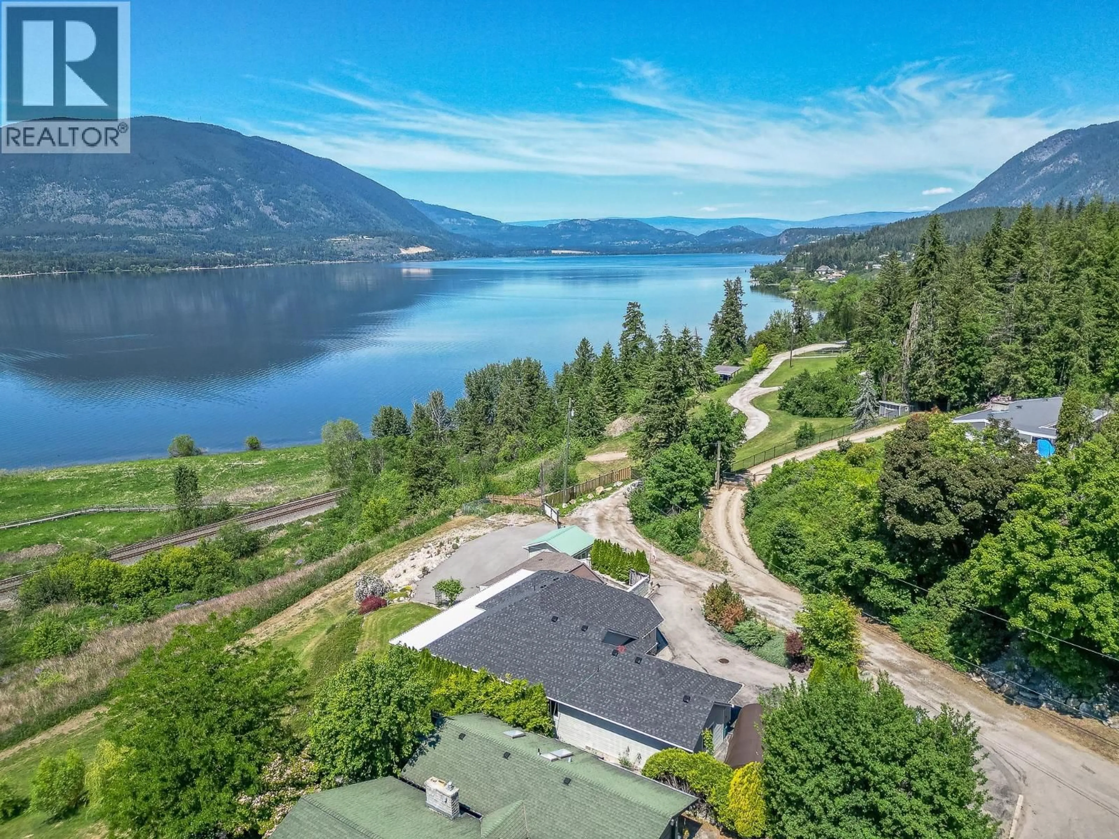 A pic from outside/outdoor area/front of a property/back of a property/a pic from drone, water/lake/river/ocean view for 1660 28 AVENUE NORTHEAST, Salmon Arm British Columbia V1E3X2