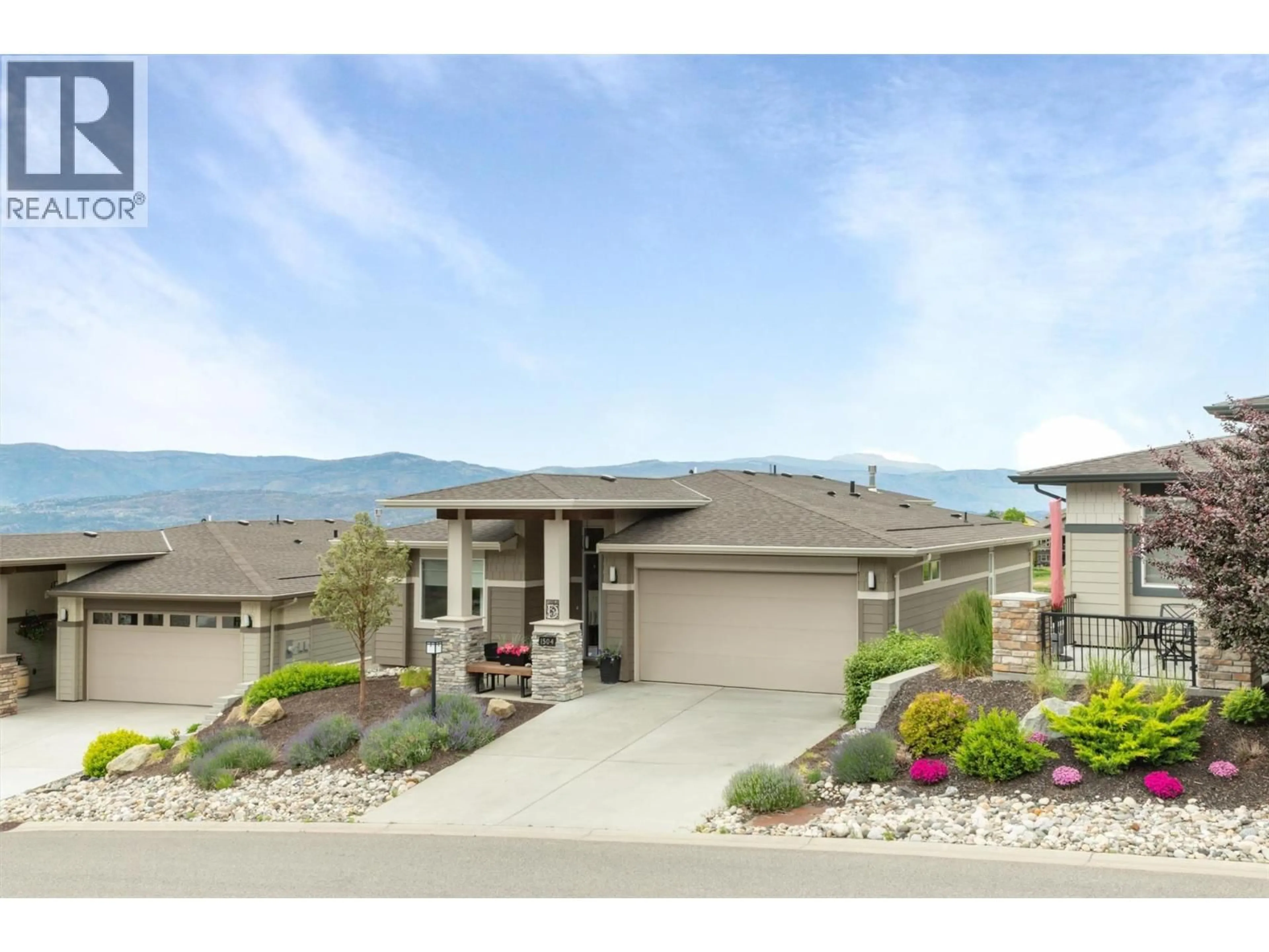 Home with vinyl exterior material, mountain view for 1504 TOWER RANCH DRIVE, Kelowna British Columbia V1P1T8