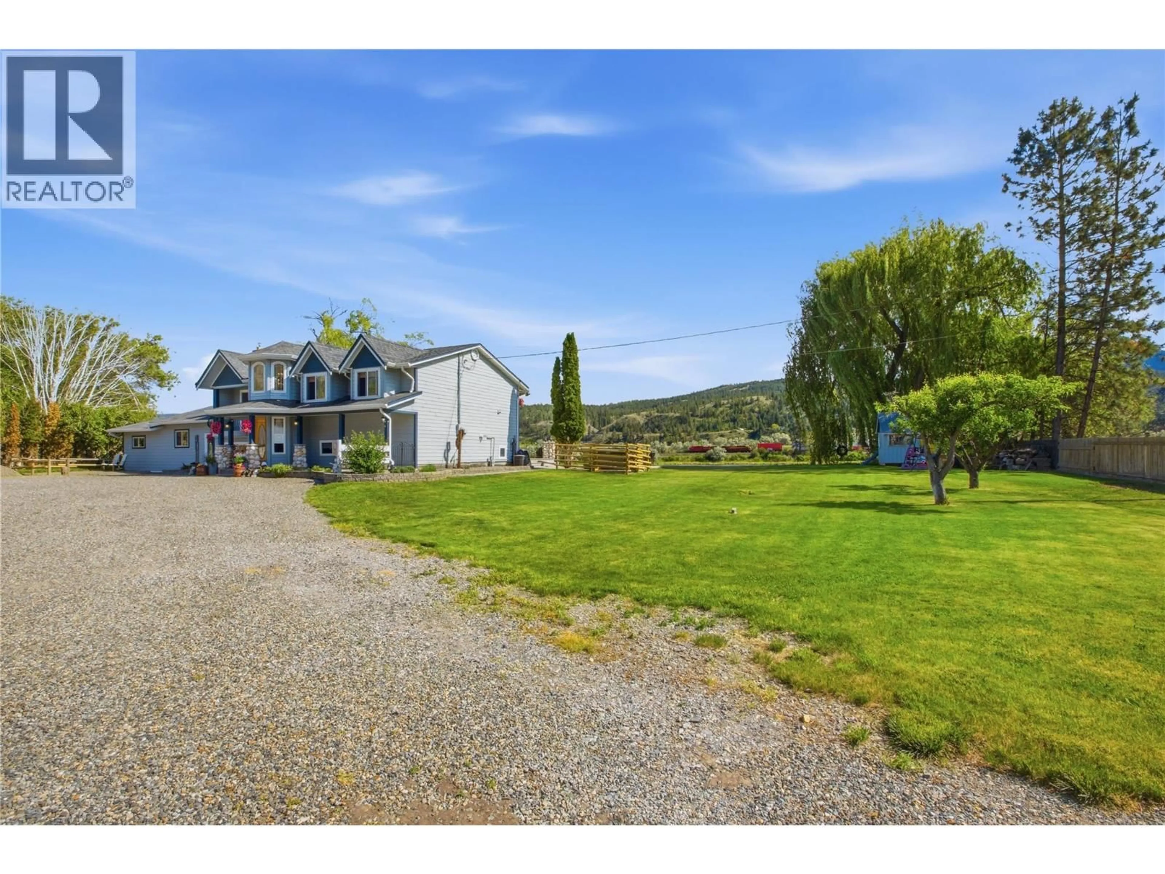 A pic from outside/outdoor area/front of a property/back of a property/a pic from drone, water/lake/river/ocean view for 392 TEAL ROAD, Kamloops British Columbia V2H1S5