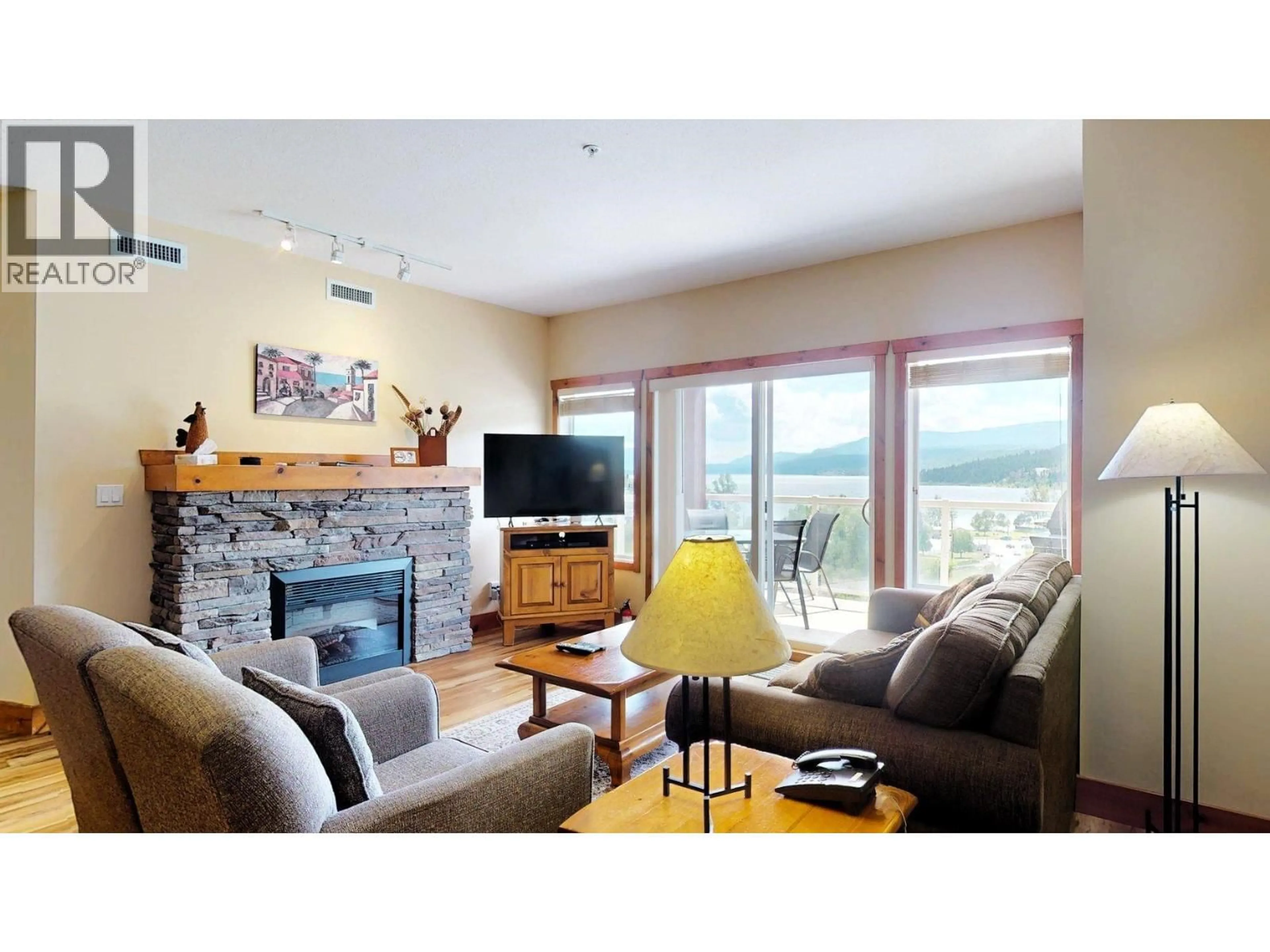 Living room with furniture, wood/laminate floor for 219 I - 701 14A CRESCENT, Invermere British Columbia V0A1K0