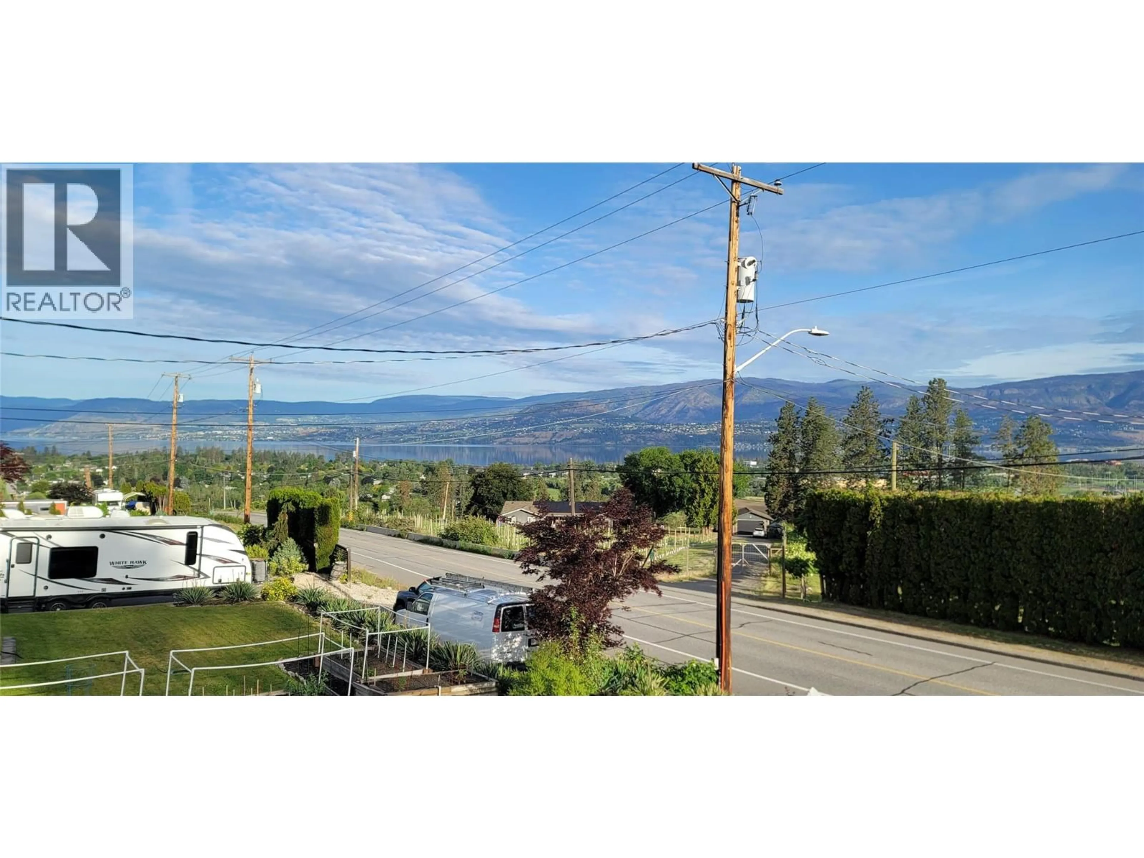 A pic from outside/outdoor area/front of a property/back of a property/a pic from drone, mountain view for 1315 DEHART ROAD, Kelowna British Columbia V1W4N3