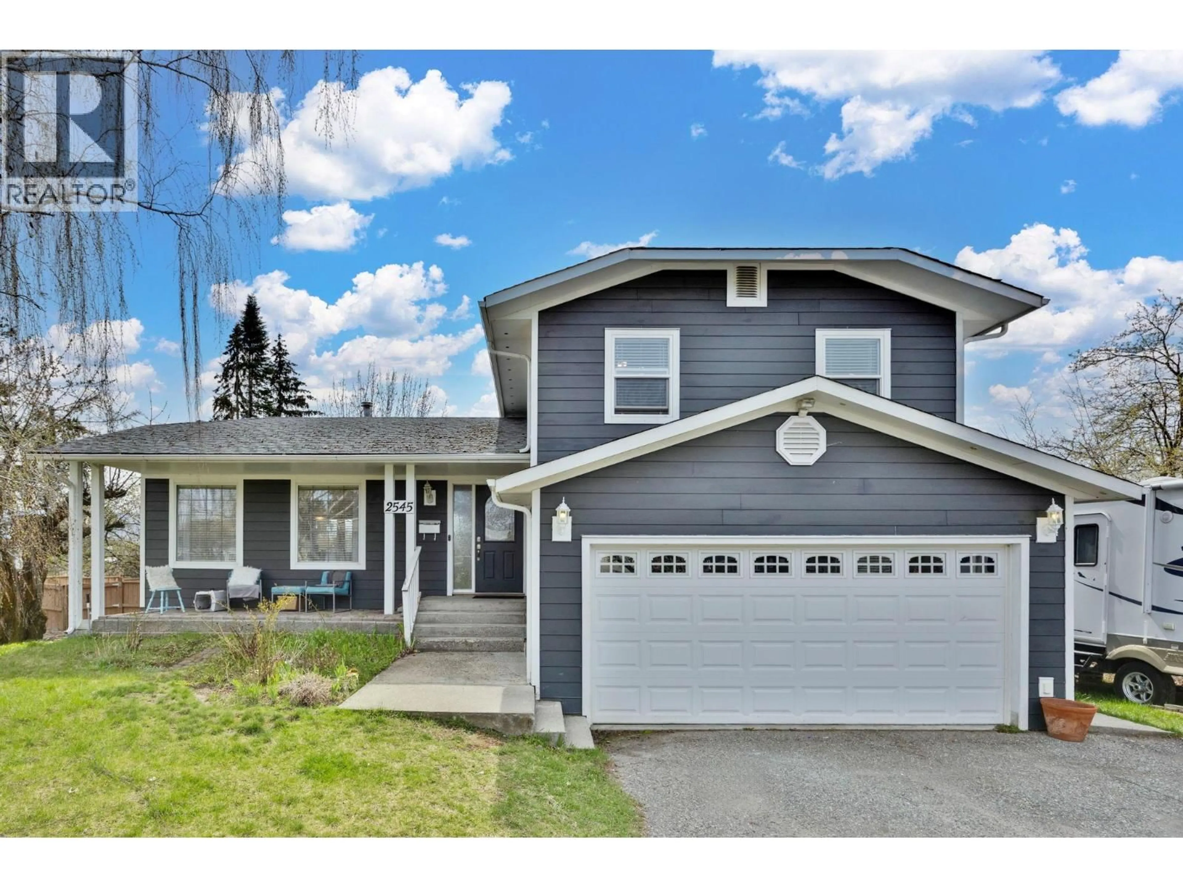 Home with vinyl exterior material, street for 2545 CRESTVIEW ROAD, West Kelowna British Columbia V1Z1Z4