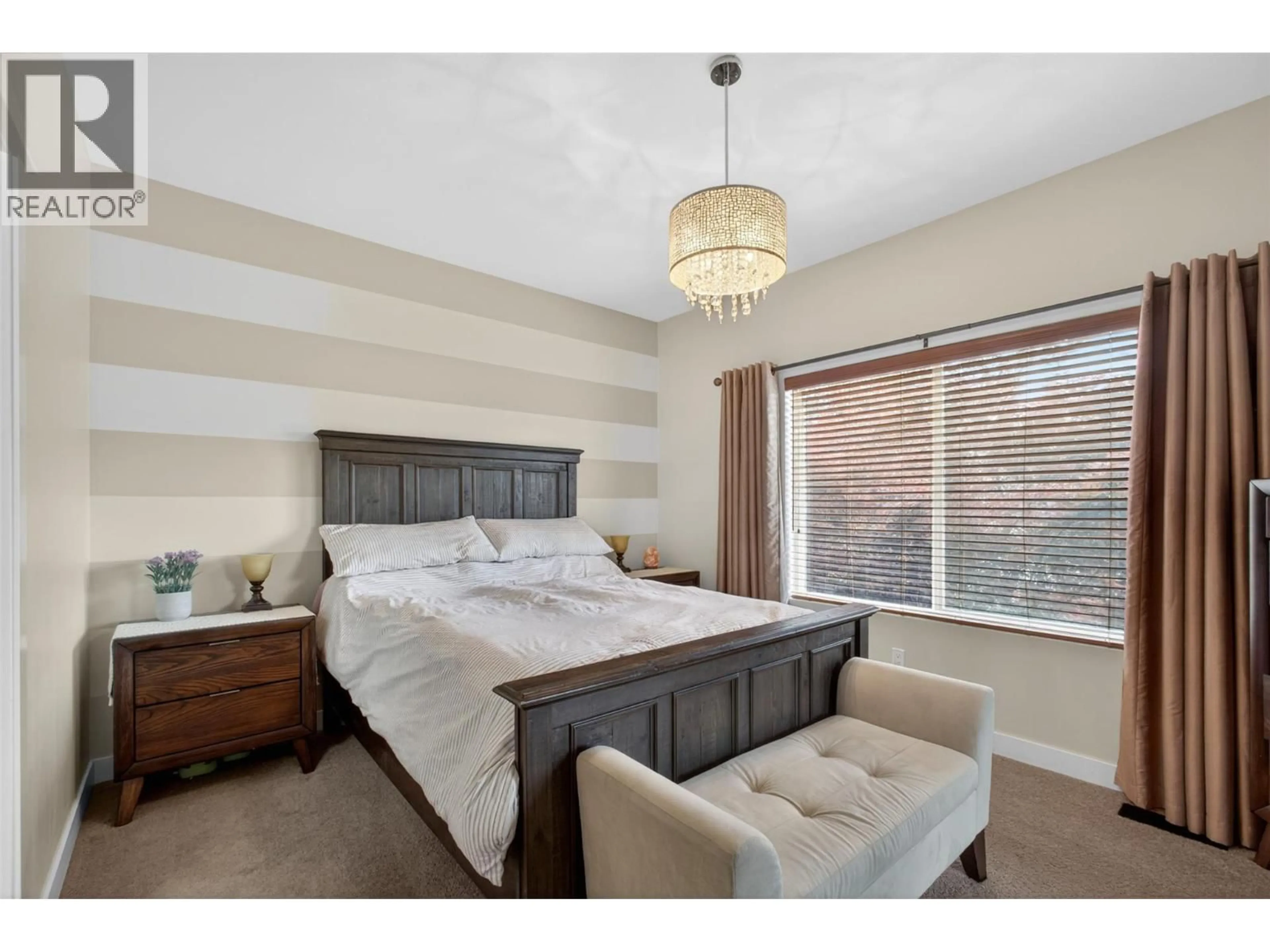 Bedroom with bed, wood/laminate floor for 2054 ELKRIDGE DRIVE, West Kelowna British Columbia V4T3K1