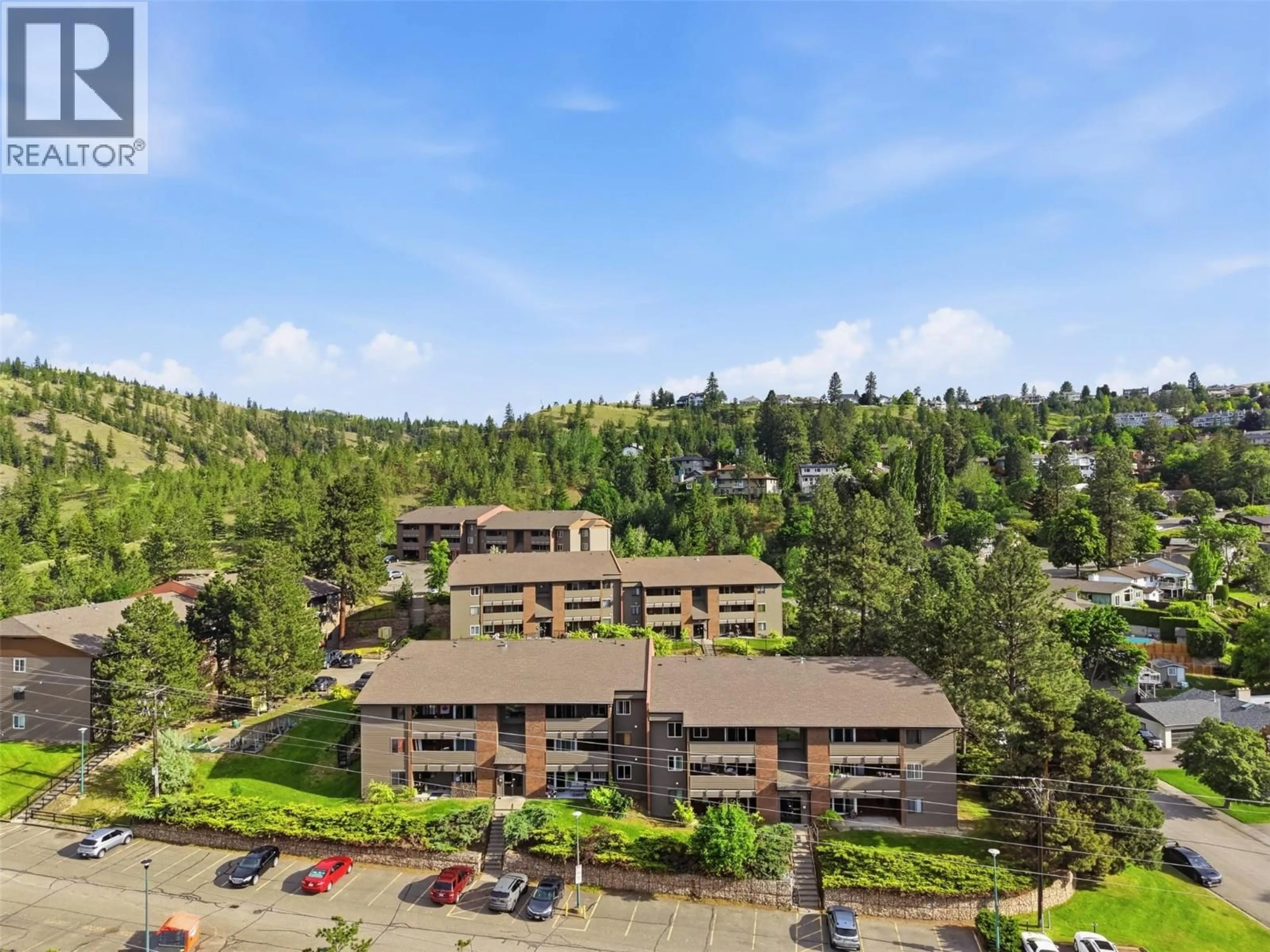 A pic from outside/outdoor area/front of a property/back of a property/a pic from drone, mountain view for 102 - 44 WHITESHIELD CRESCENT SOUTH, Kamloops British Columbia V2E2J1