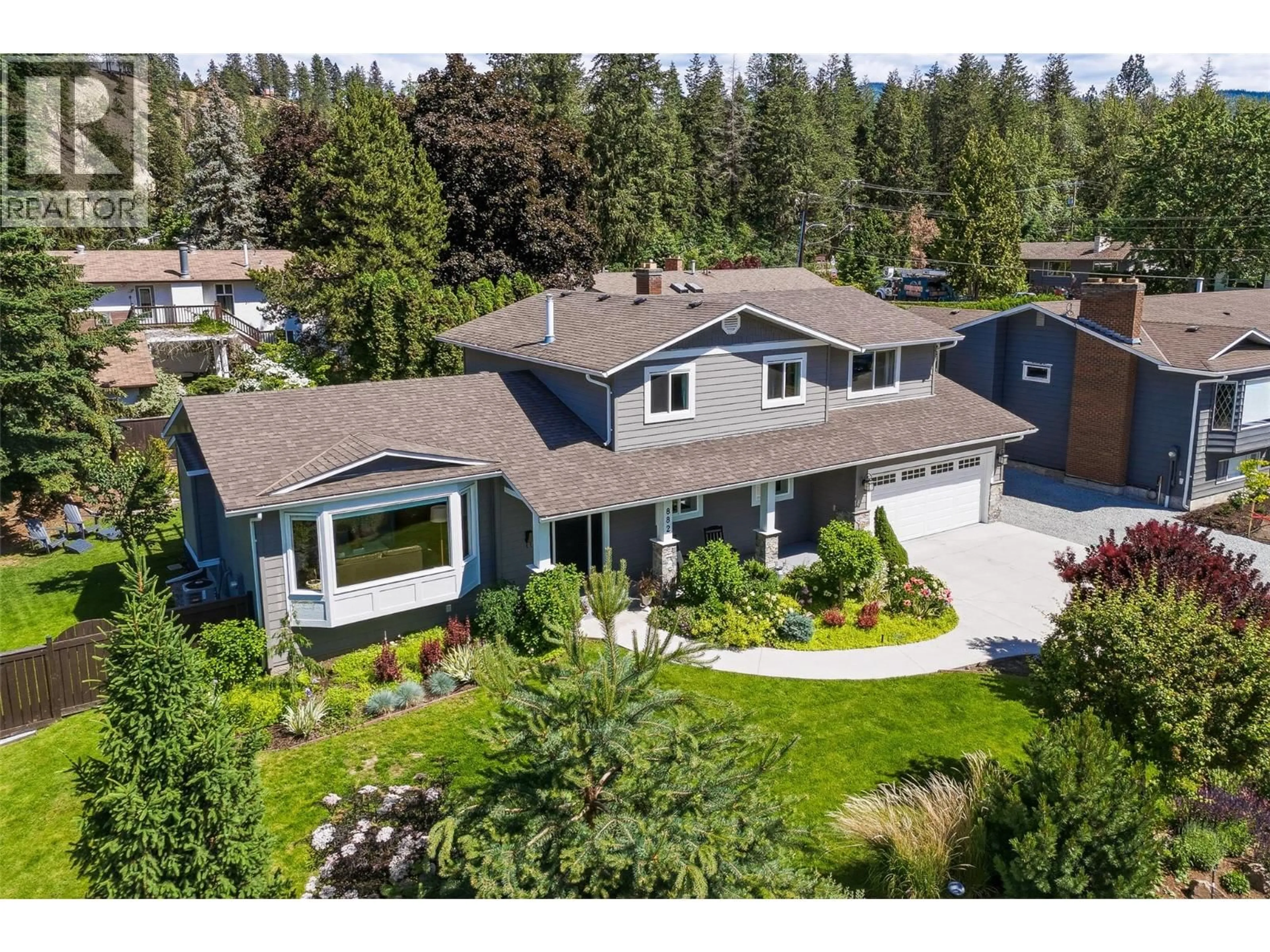 A pic from outside/outdoor area/front of a property/back of a property/a pic from drone, unknown for 882 ROMA COURT, Kelowna British Columbia V1W2P6