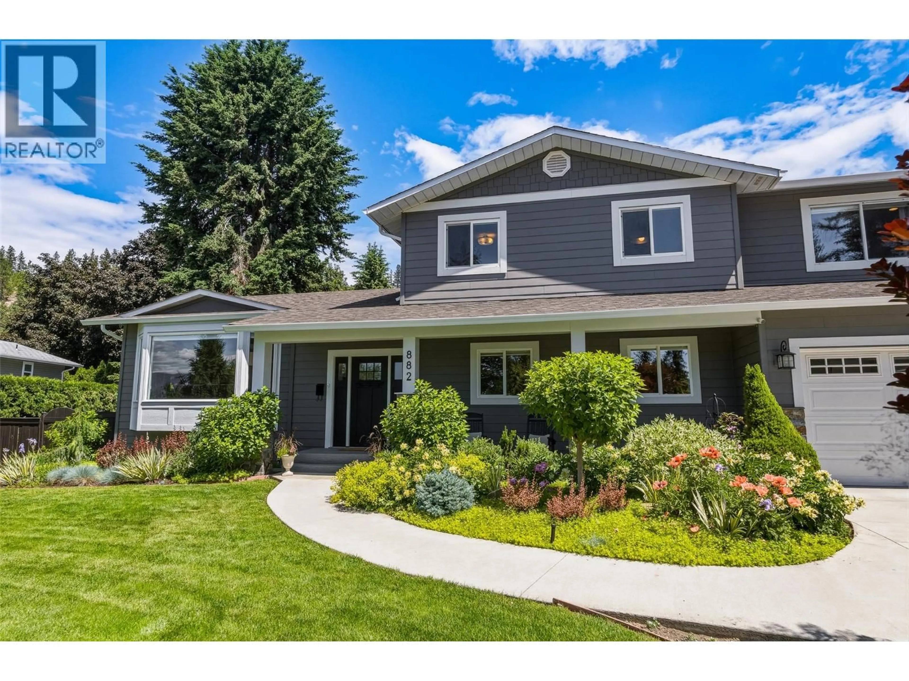 Home with vinyl exterior material, street for 882 ROMA COURT, Kelowna British Columbia V1W2P6