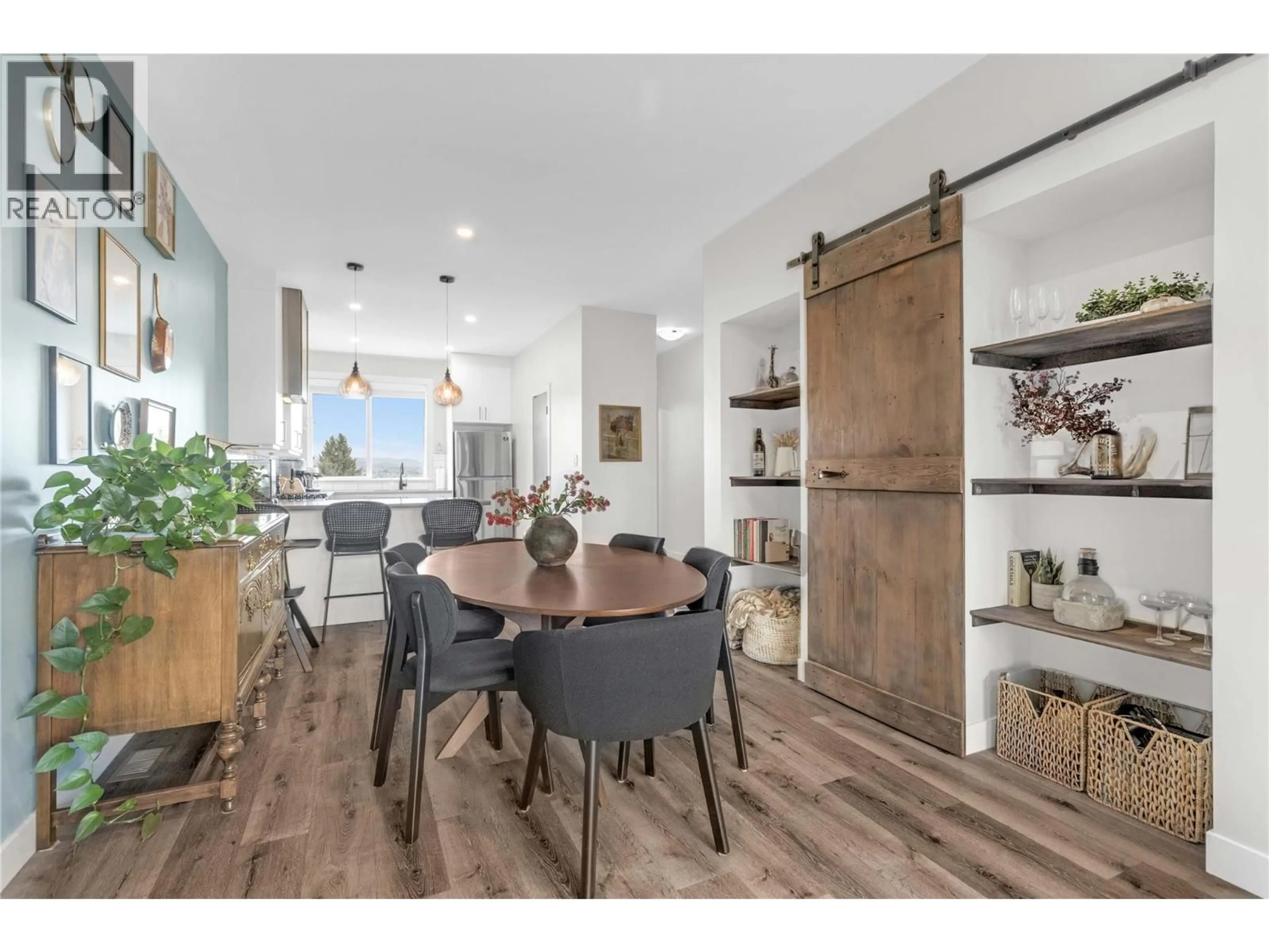 Open concept kitchen, wood/laminate floor for 2 - 3405 16 AVENUE, Vernon British Columbia V1T5Z1