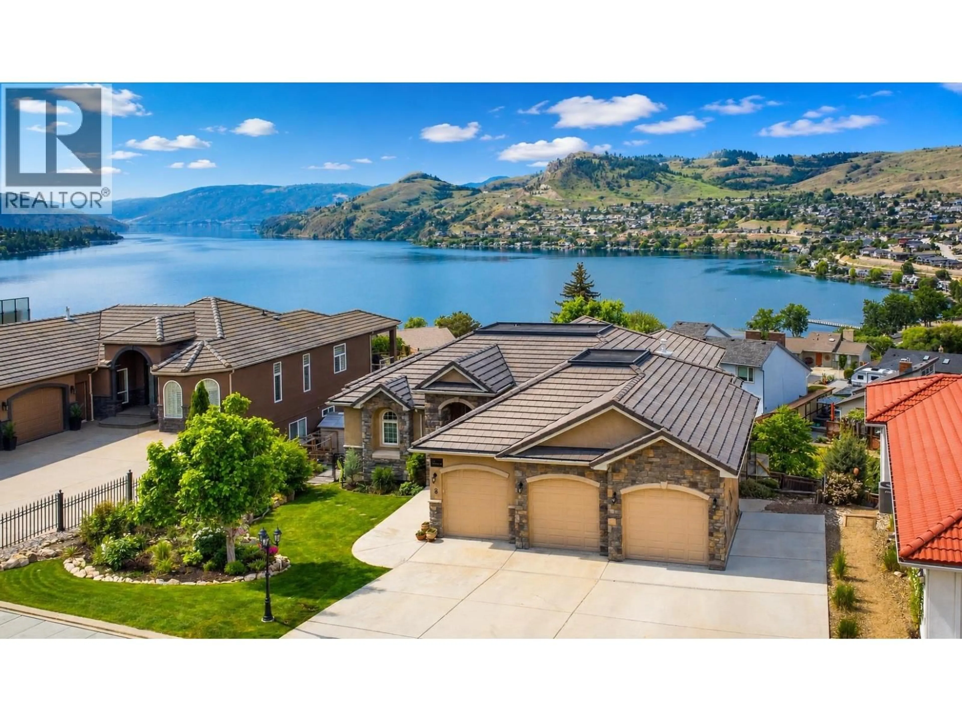 A pic from outside/outdoor area/front of a property/back of a property/a pic from drone, water/lake/river/ocean view for #8 BAYVIEW HEIGHTS, Coldstream British Columbia V1B2B9