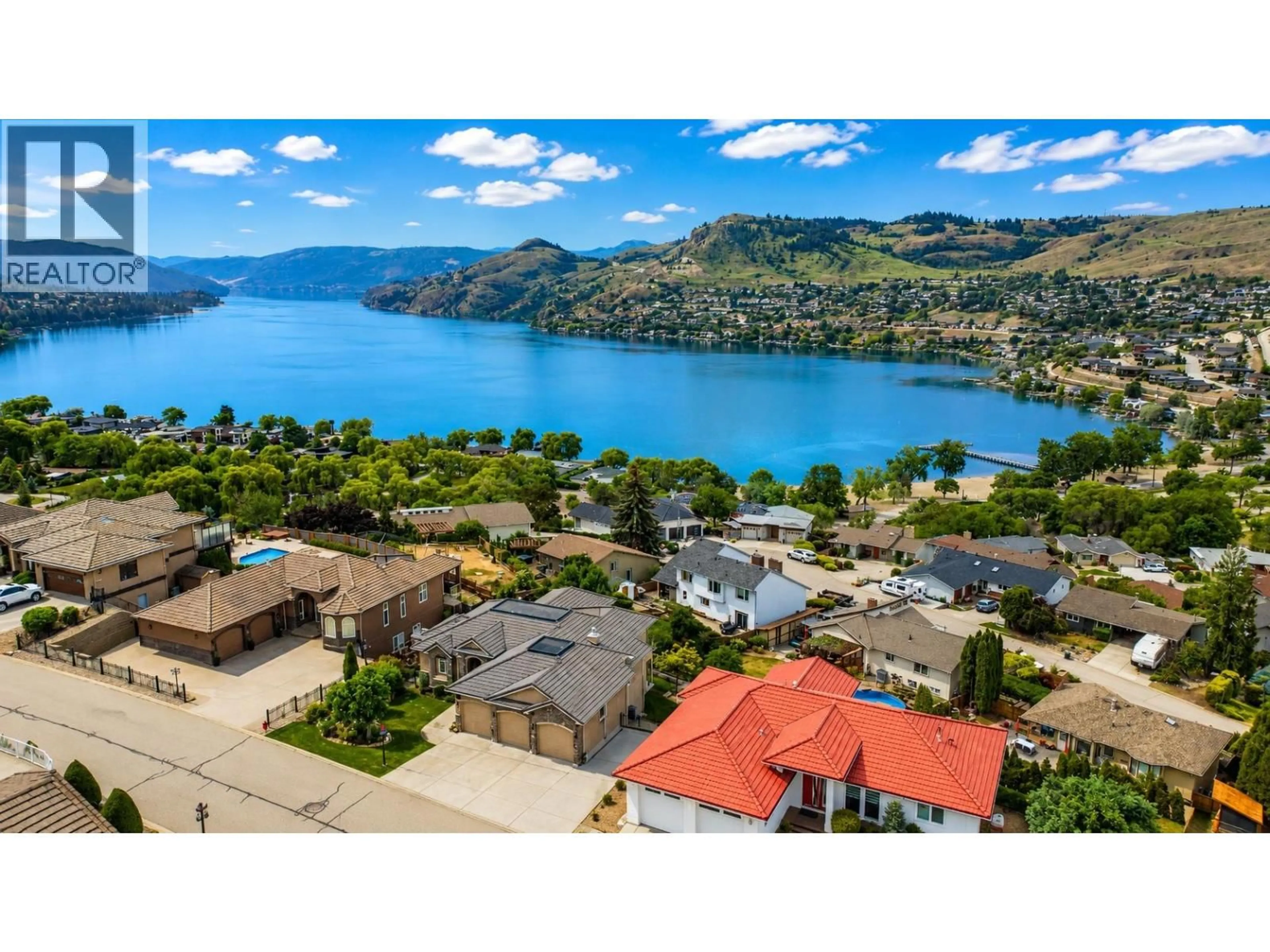 A pic from outside/outdoor area/front of a property/back of a property/a pic from drone, water/lake/river/ocean view for #8 BAYVIEW HEIGHTS, Coldstream British Columbia V1B2B9
