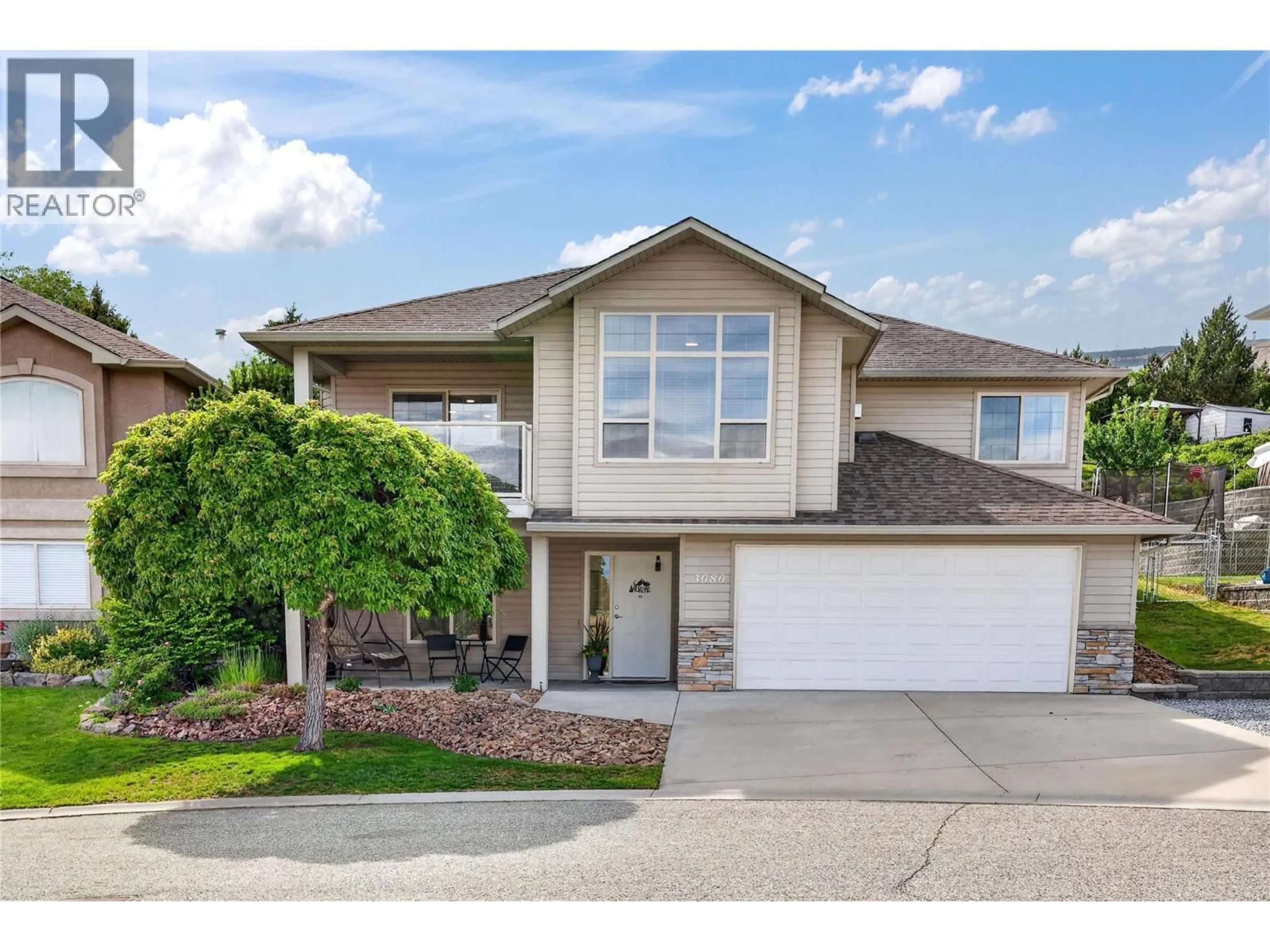 Home with vinyl exterior material, street for 3080 BRIDLEHILL DRIVE, West Kelowna British Columbia V4T2W2