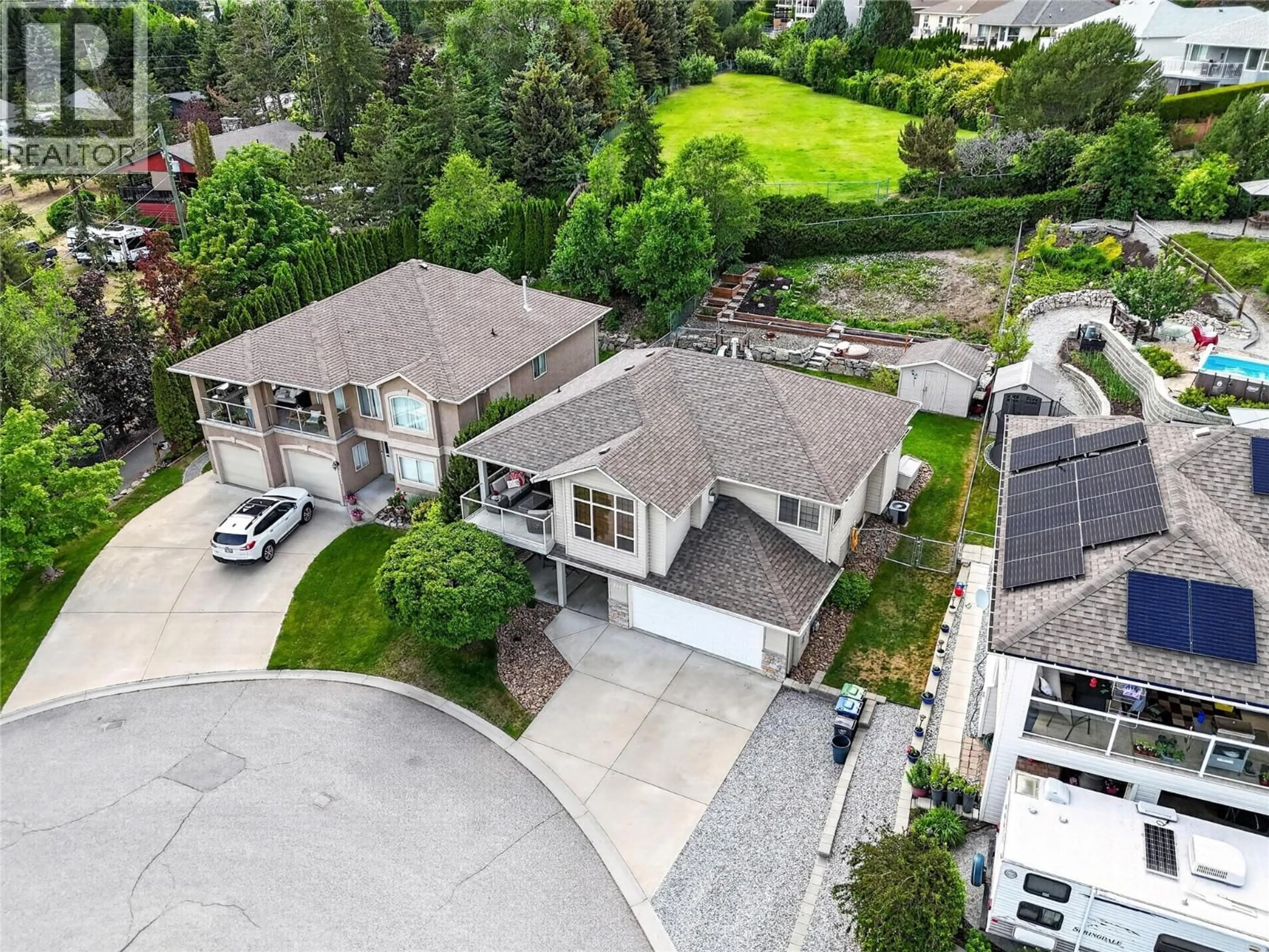 A pic from outside/outdoor area/front of a property/back of a property/a pic from drone, street for 3080 BRIDLEHILL DRIVE, West Kelowna British Columbia V4T2W2