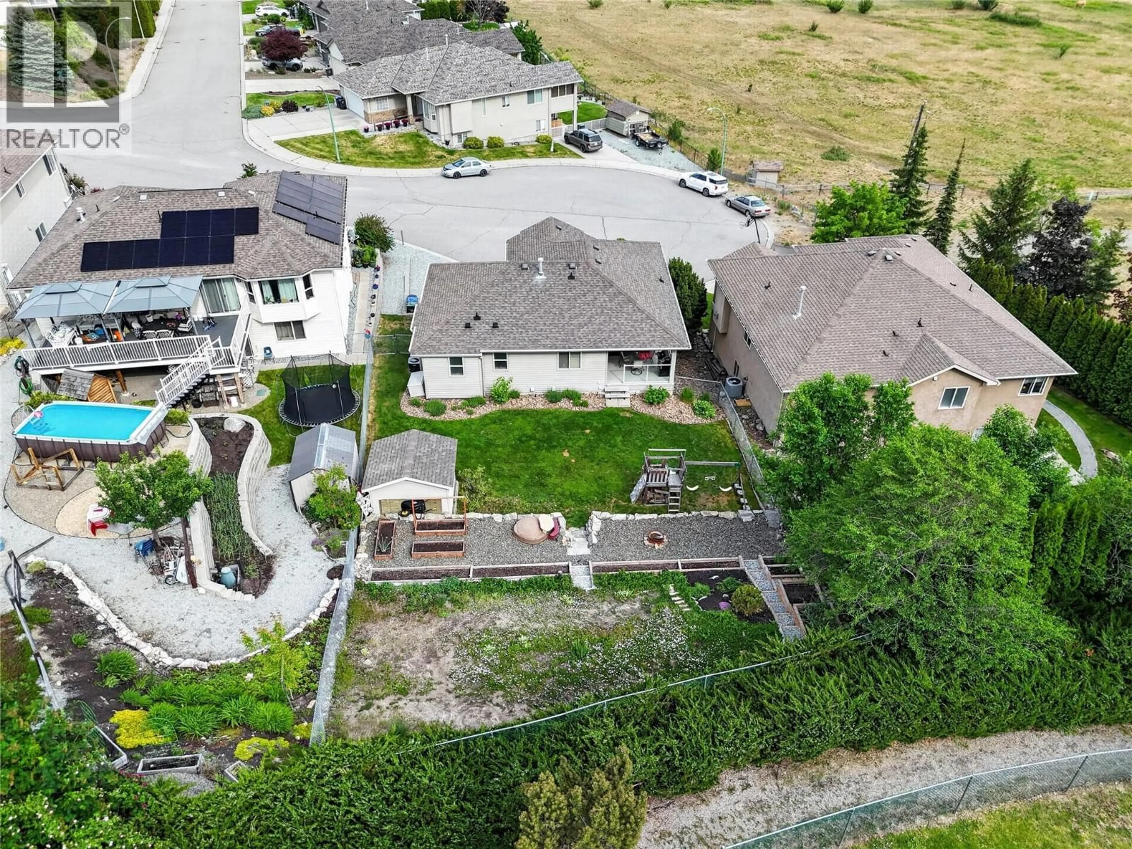 A pic from outside/outdoor area/front of a property/back of a property/a pic from drone, mountain view for 3080 BRIDLEHILL DRIVE, West Kelowna British Columbia V4T2W2