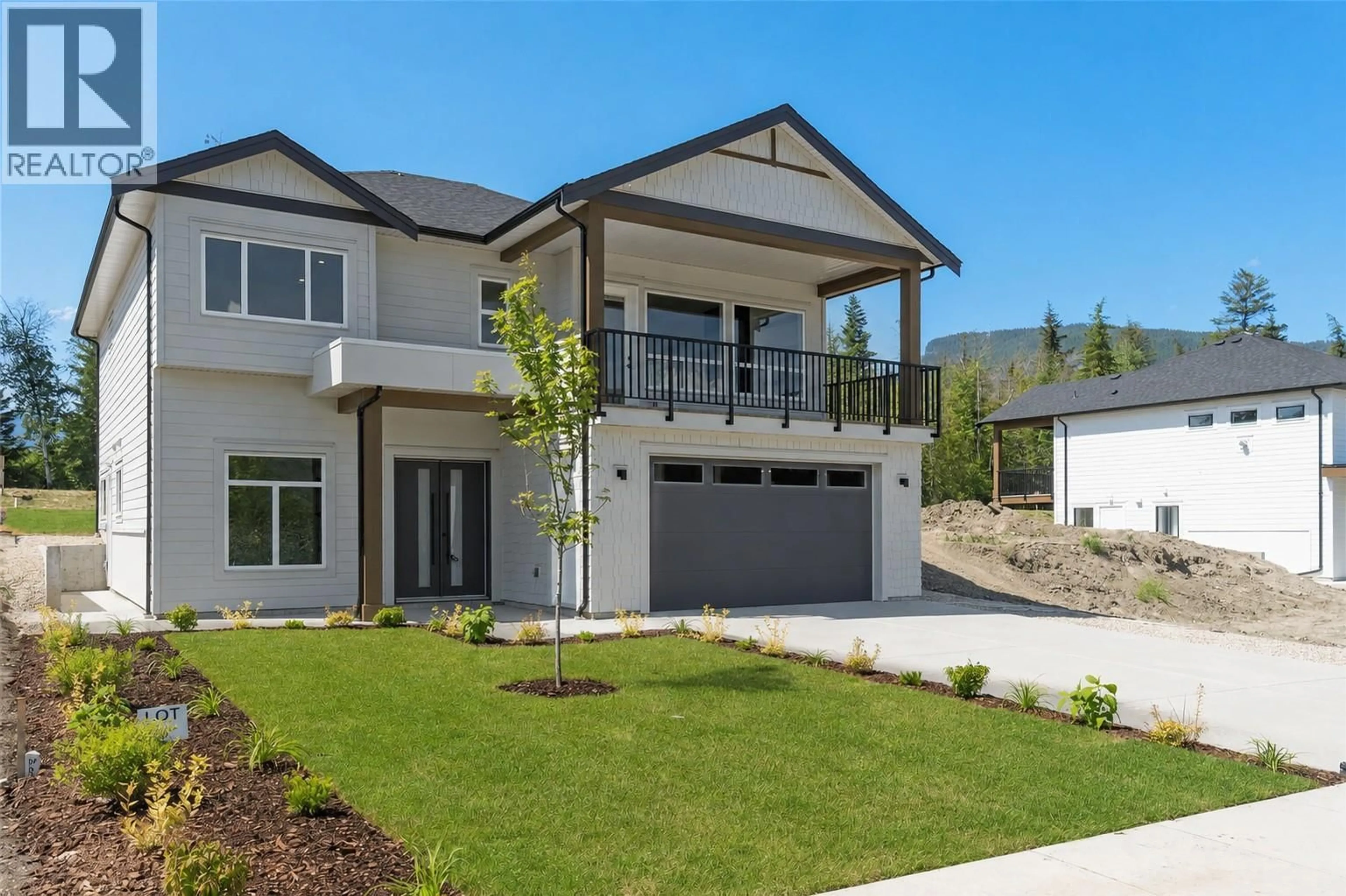Home with vinyl exterior material, mountain view for 6821 42 STREET NORTHEAST, Salmon Arm British Columbia V0E1K0