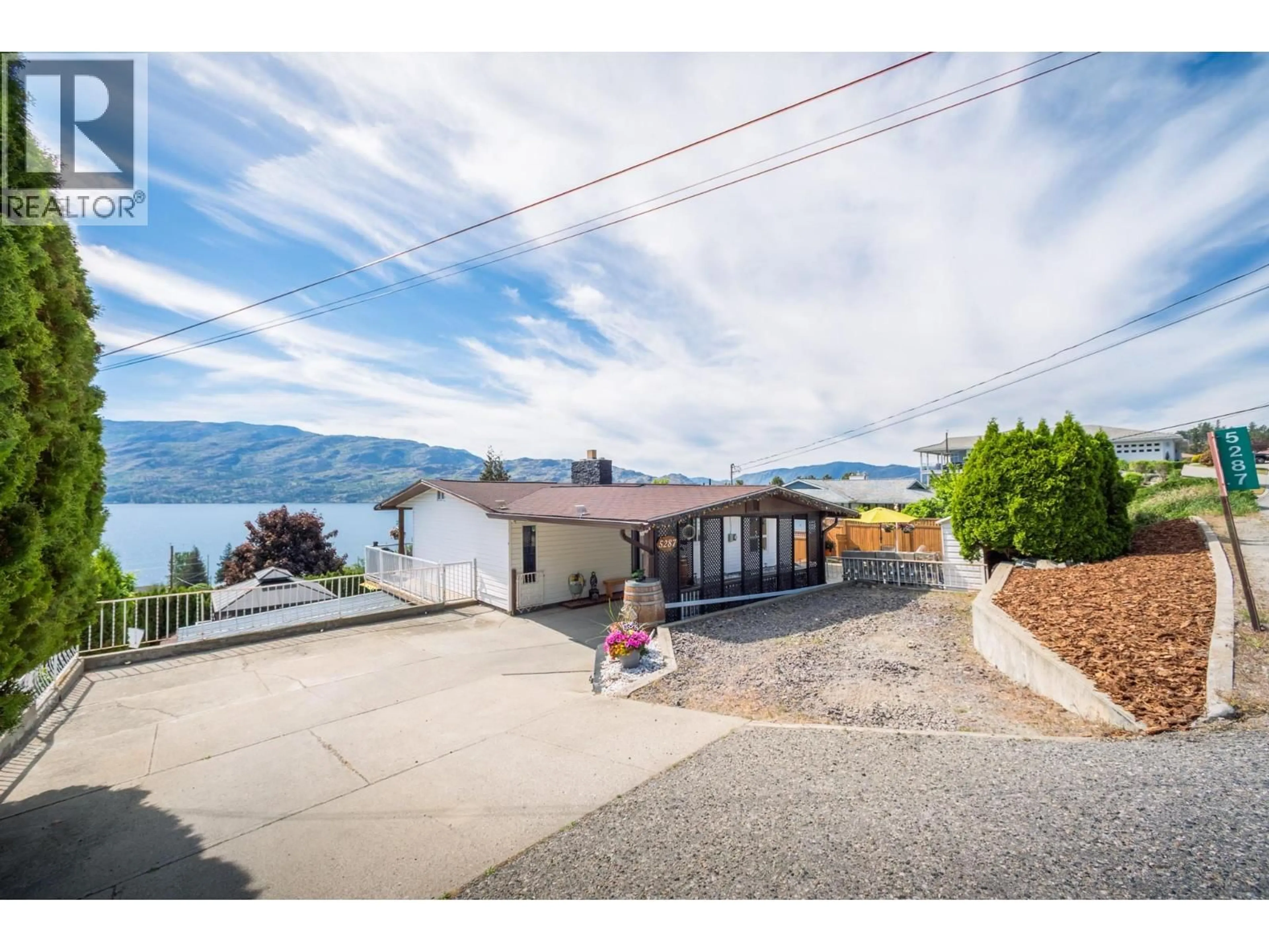 A pic from outside/outdoor area/front of a property/back of a property/a pic from drone, water/lake/river/ocean view for 5287 GREATA ROAD, Peachland British Columbia V0H1X2