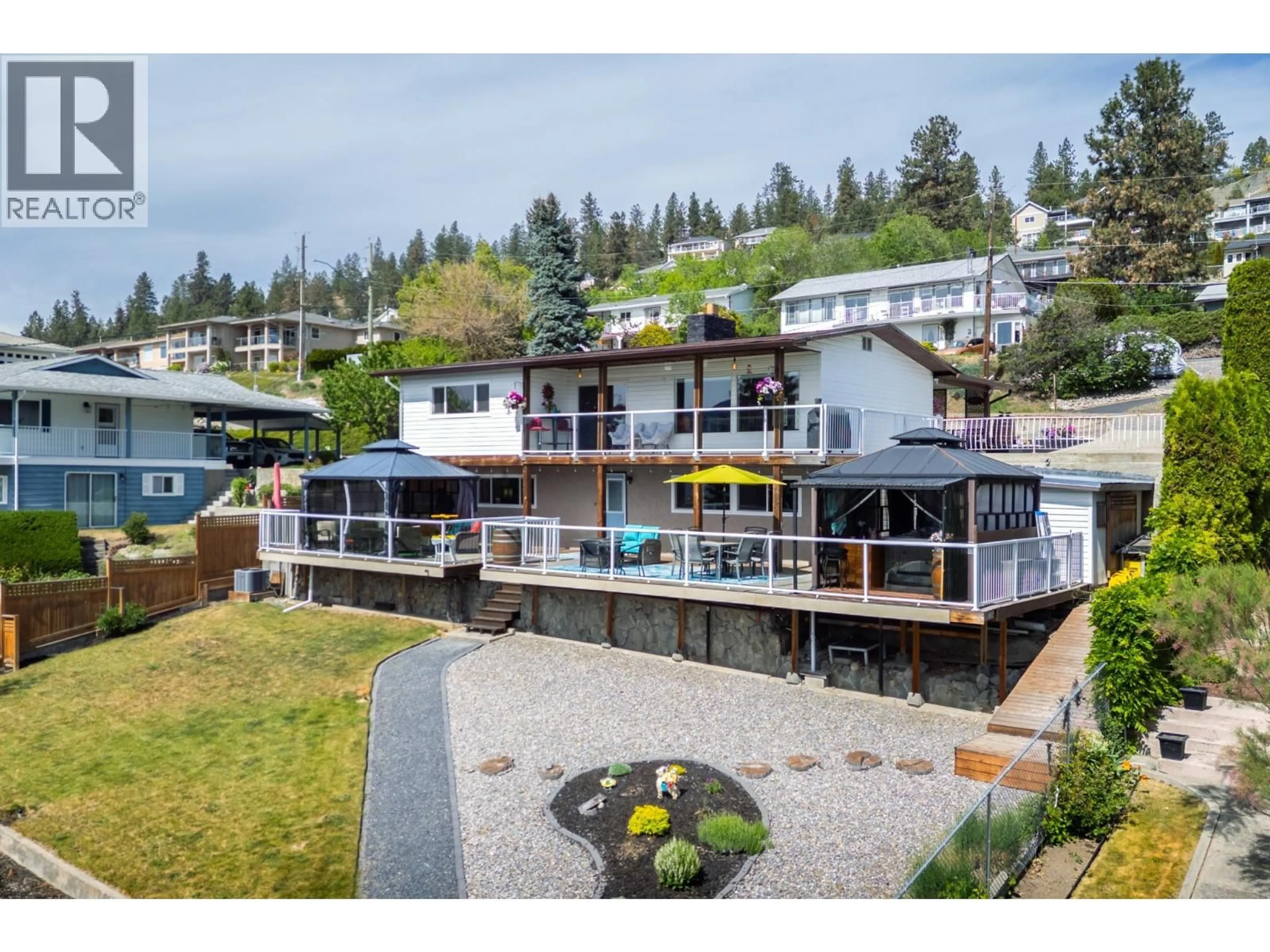 A pic from outside/outdoor area/front of a property/back of a property/a pic from drone, water/lake/river/ocean view for 5287 GREATA ROAD, Peachland British Columbia V0H1X2