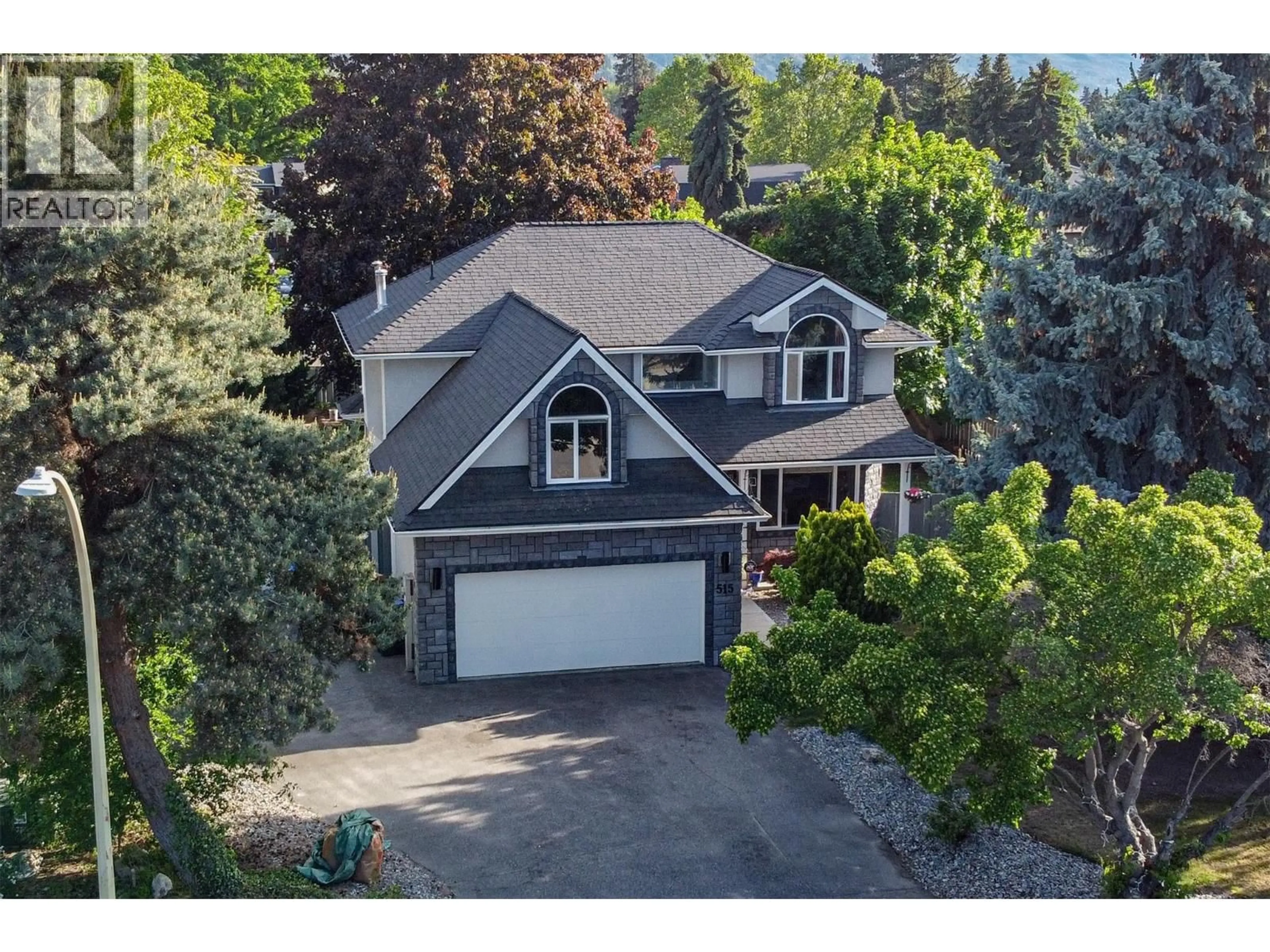 A pic from outside/outdoor area/front of a property/back of a property/a pic from drone, street for 515 SARSONS ROAD, Kelowna British Columbia V1W2X3