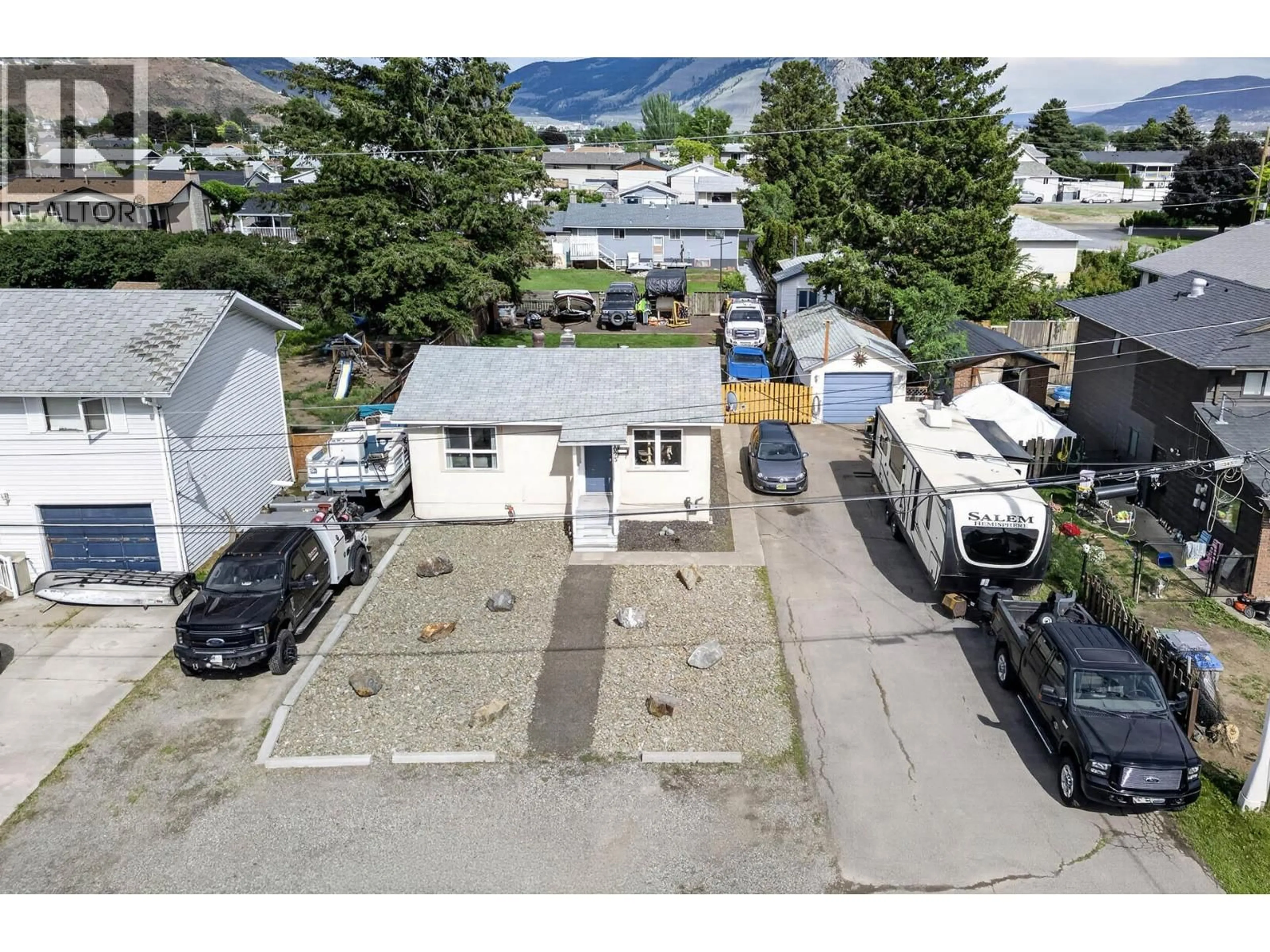 A pic from outside/outdoor area/front of a property/back of a property/a pic from drone, mountain view for 1023 LAROQUE STREET, Kamloops British Columbia V2B5L6