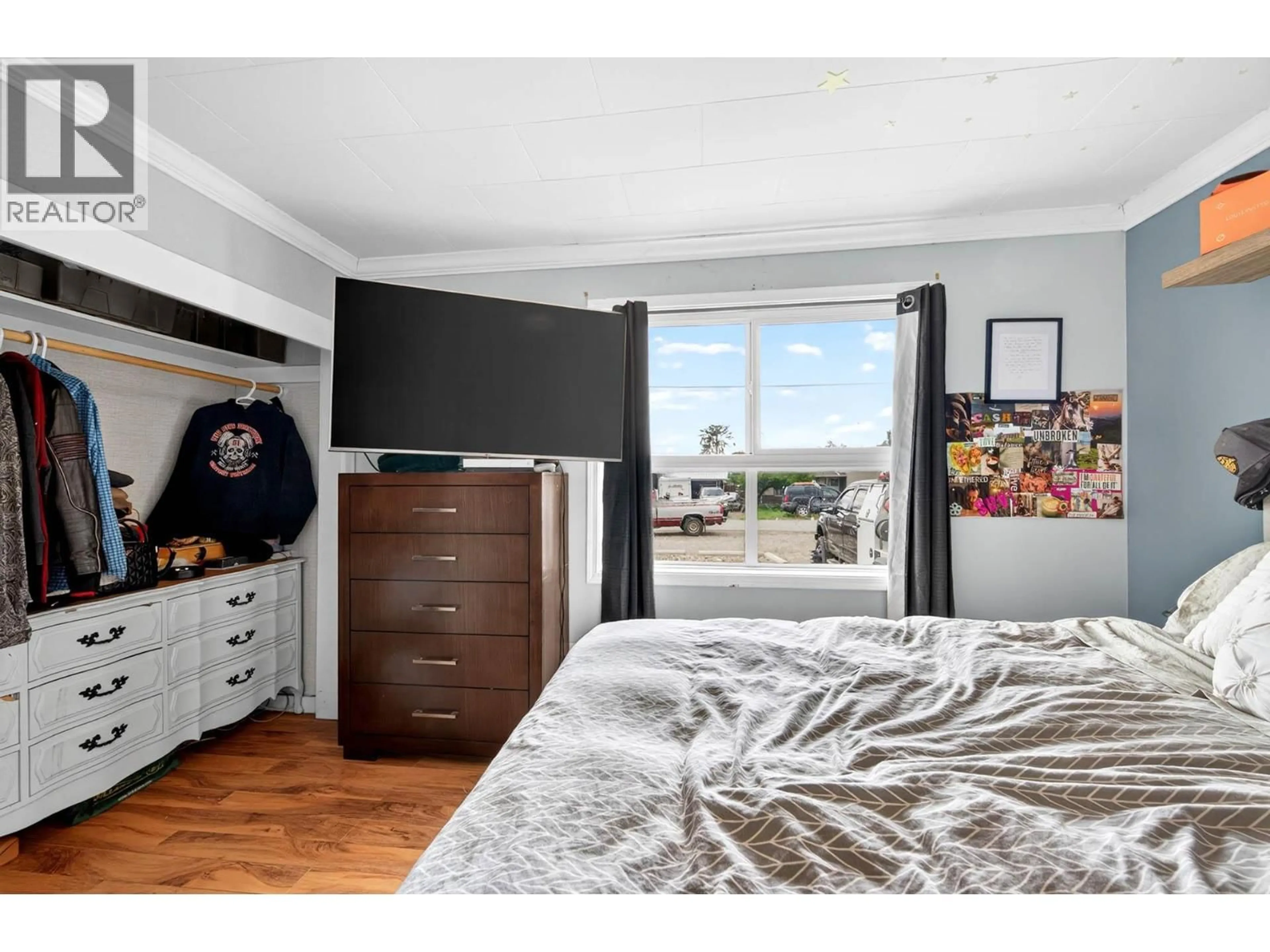 Bedroom with bed, wood/laminate floor for 1023 LAROQUE STREET, Kamloops British Columbia V2B5L6