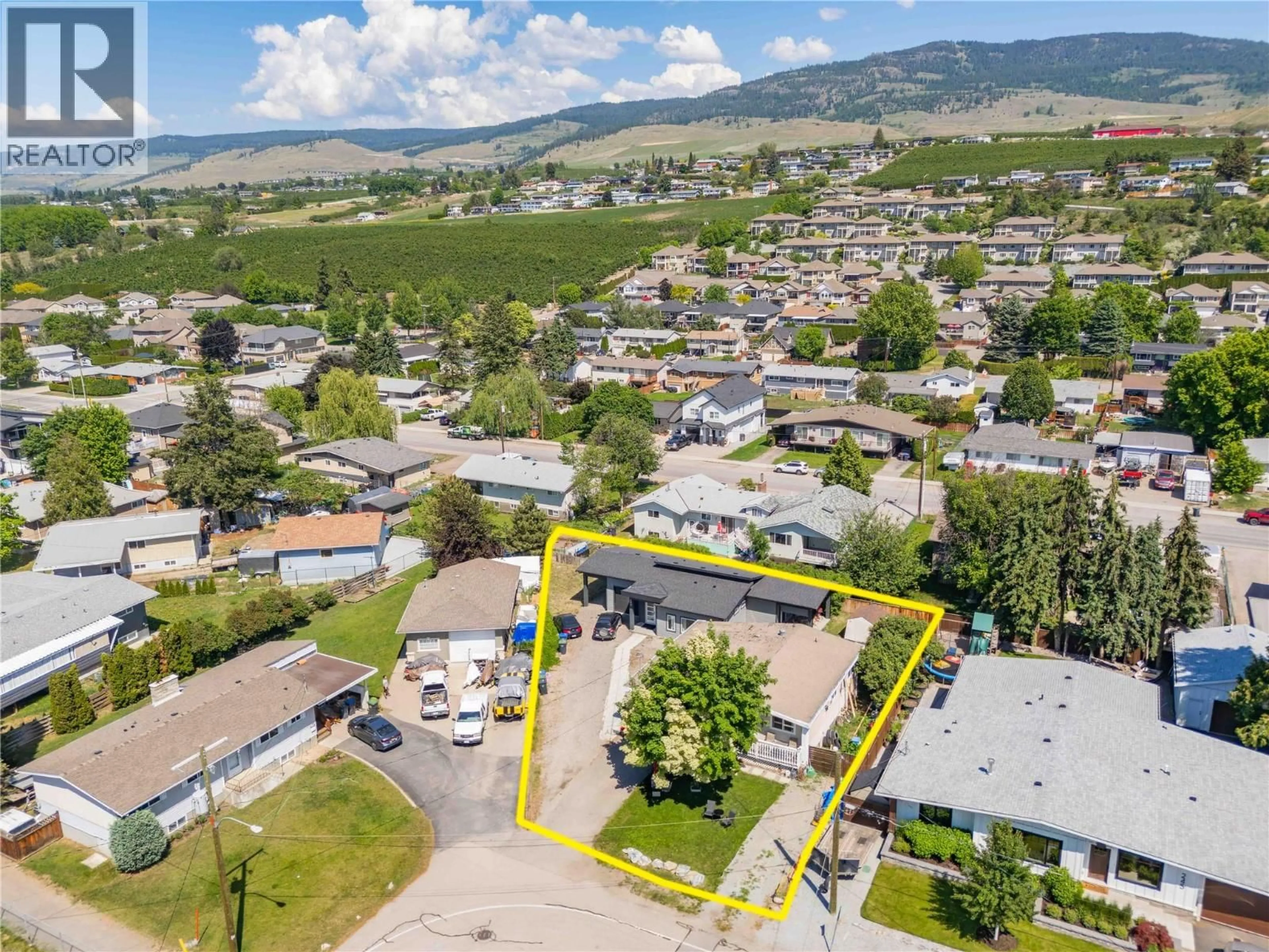 A pic from outside/outdoor area/front of a property/back of a property/a pic from drone, mountain view for 265 & 269 MUIR ROAD, Kelowna British Columbia V1X2T4