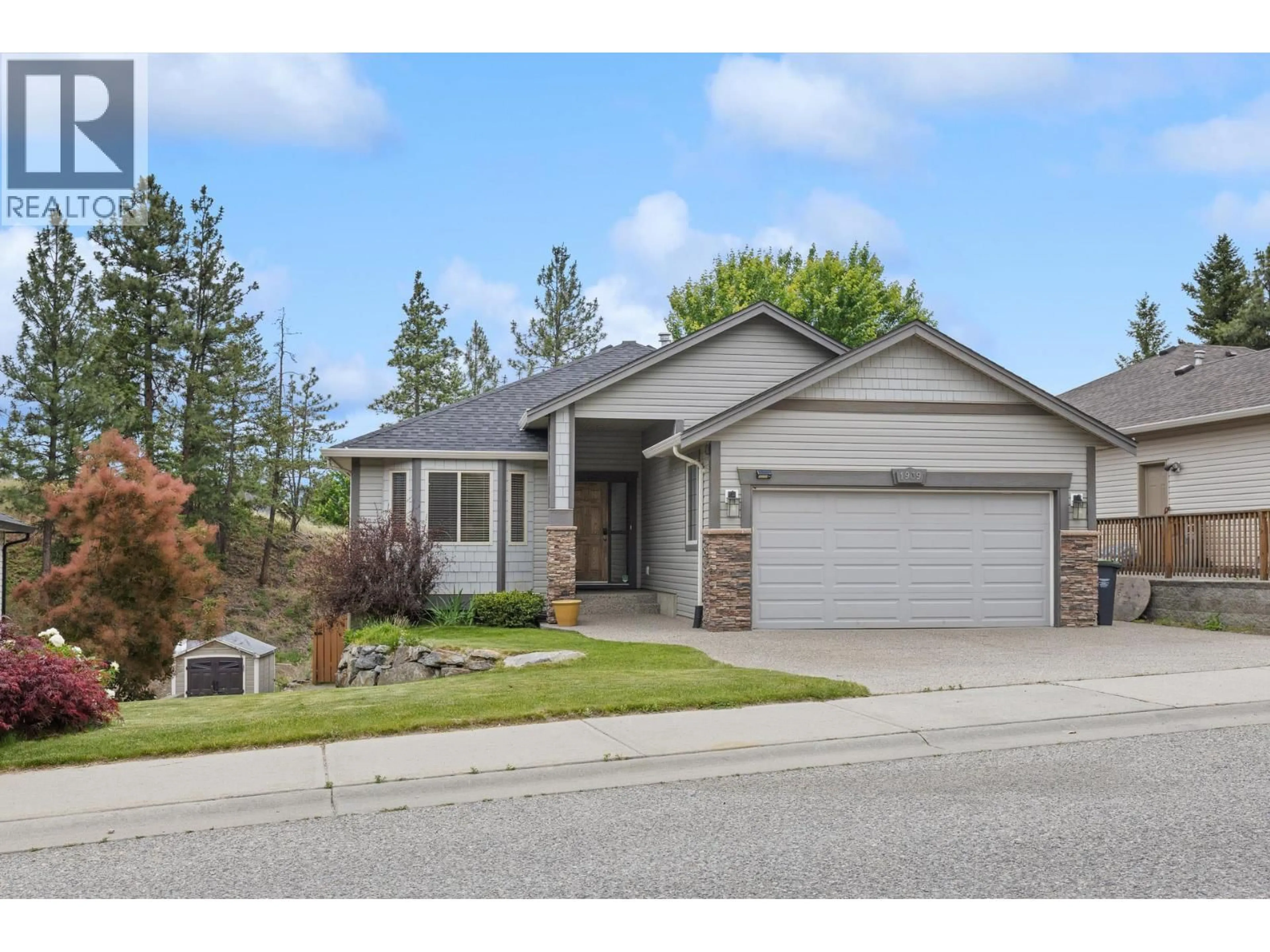 Home with vinyl exterior material, street for 1939 ROSEALEE LANE, West Kelowna British Columbia V1Z4A8