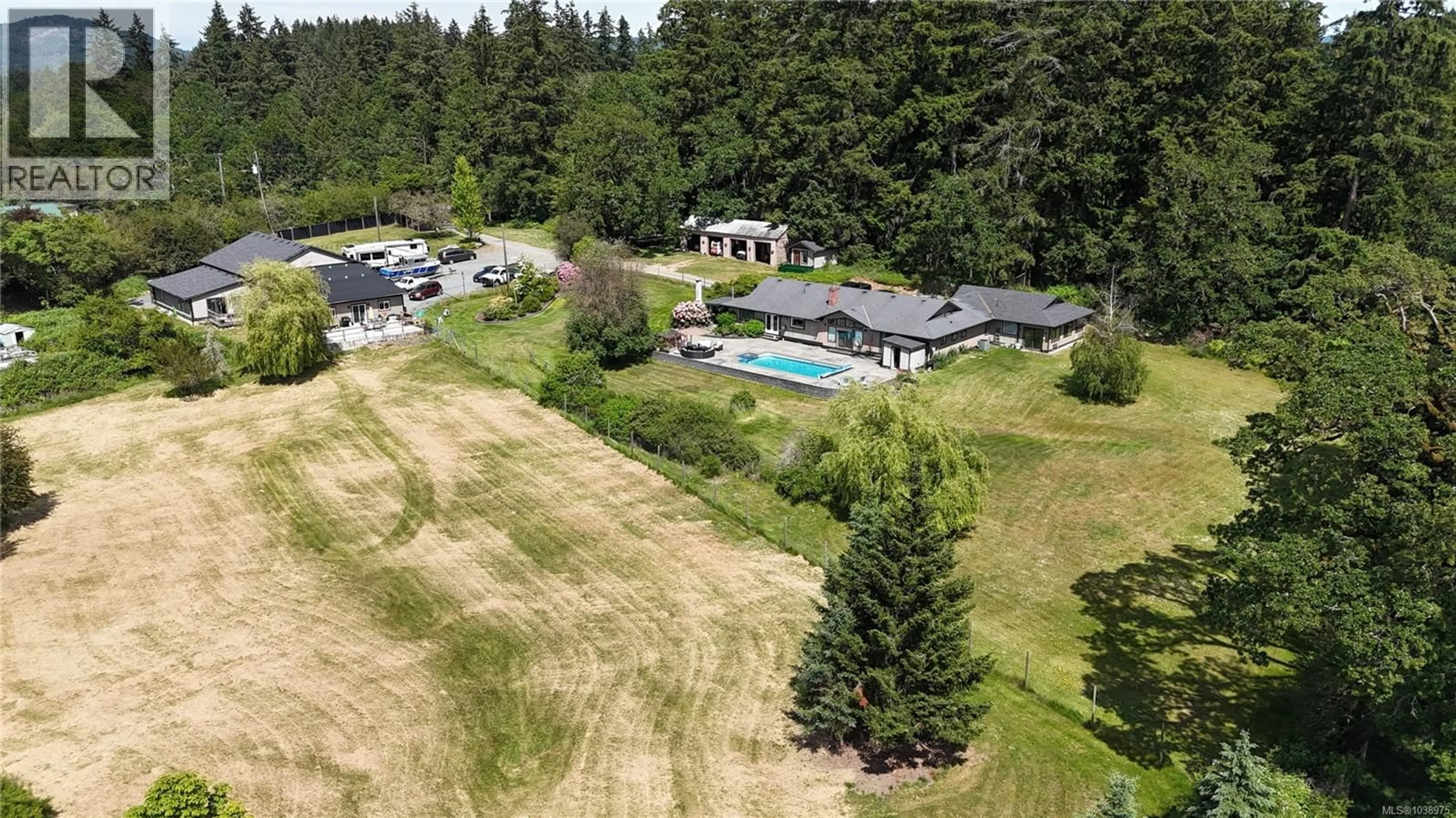 A pic from outside/outdoor area/front of a property/back of a property/a pic from drone, mountain view for 2440 ROOME ROAD, Duncan British Columbia V9L4L2