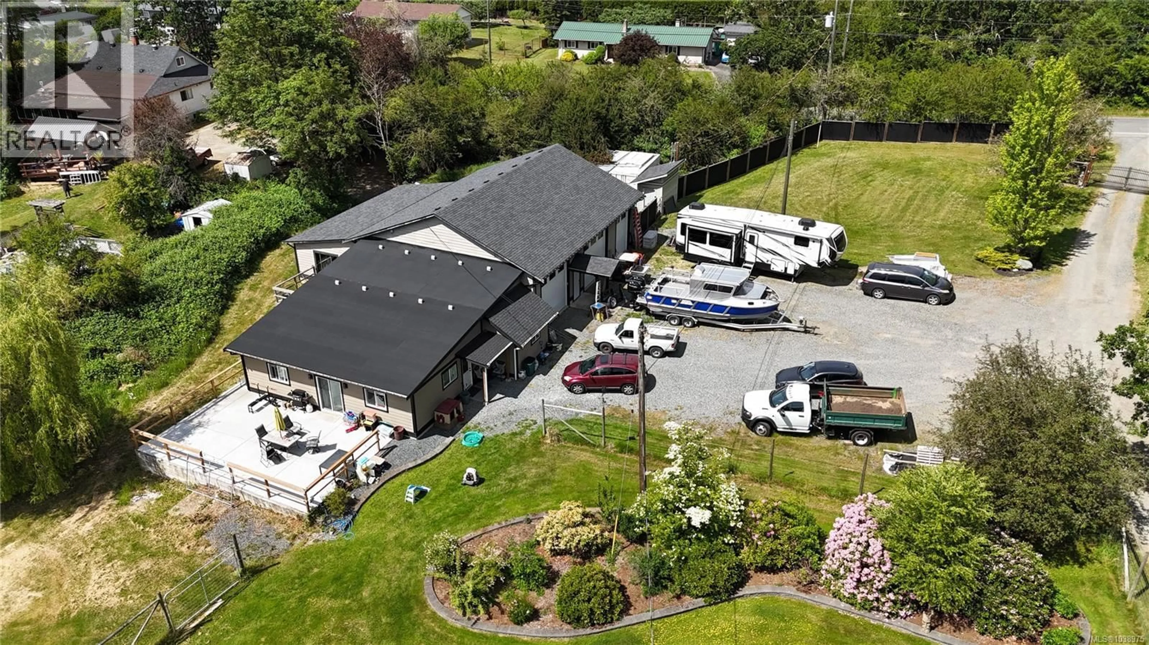 A pic from outside/outdoor area/front of a property/back of a property/a pic from drone, street for 2440 ROOME ROAD, Duncan British Columbia V9L4L2